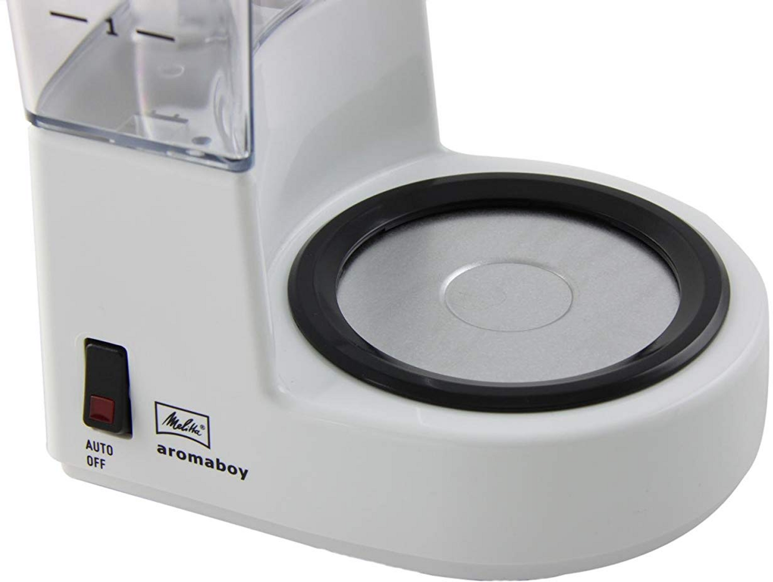 Biały ekspres do kawy Melitta. Ma czarny włącznik i zbiornik na wodę.