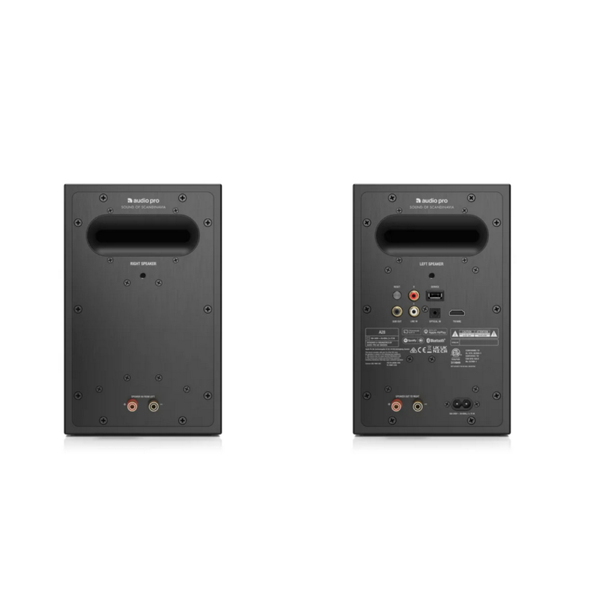 Due altoparlanti audio neri su una superficie bianca. Ognuno ha un'apertura circolare e fori per viti.
