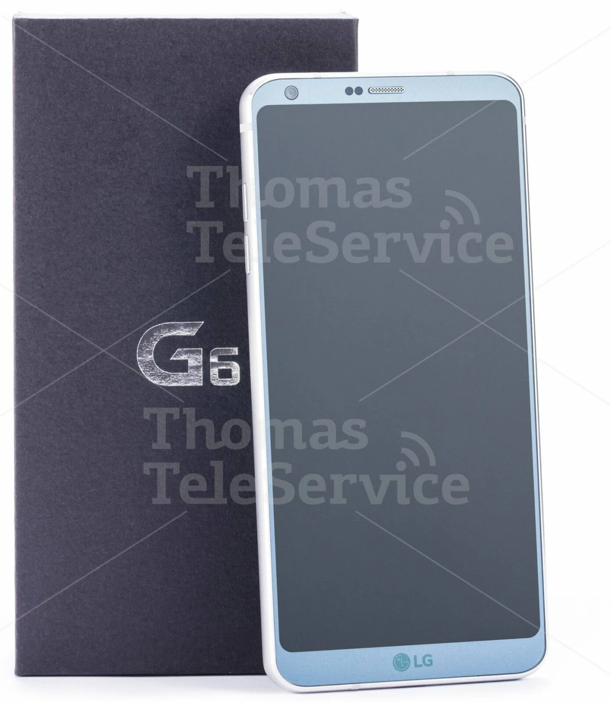 Ein LG G5 Telefon neben einer Box. Das Telefon ist silber und hat einen schwarzen Bildschirm.