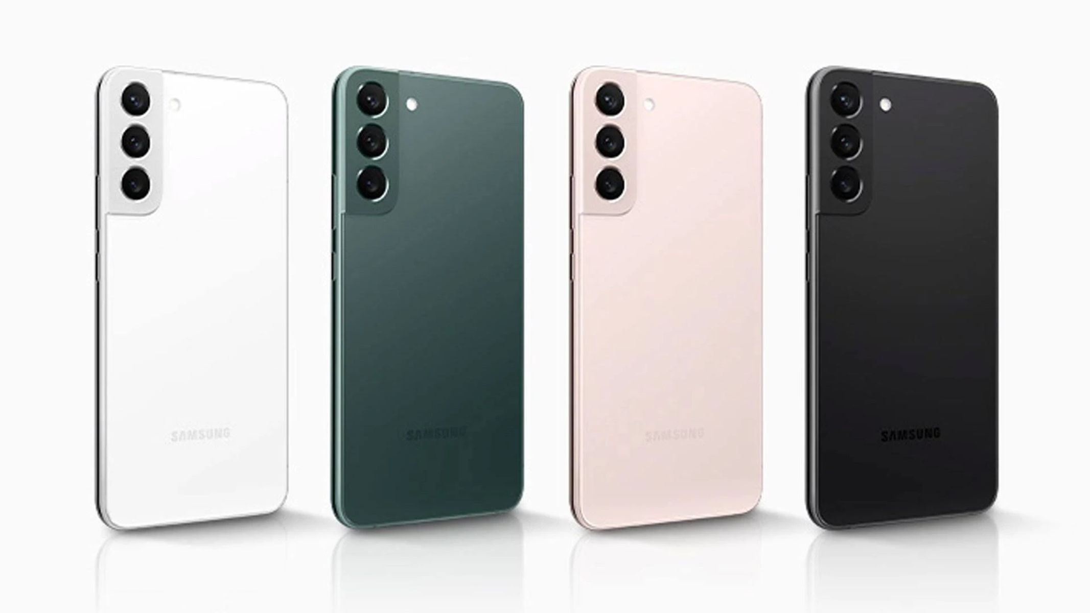 Quattro smartphone in bianco, verde, rosa e nero.