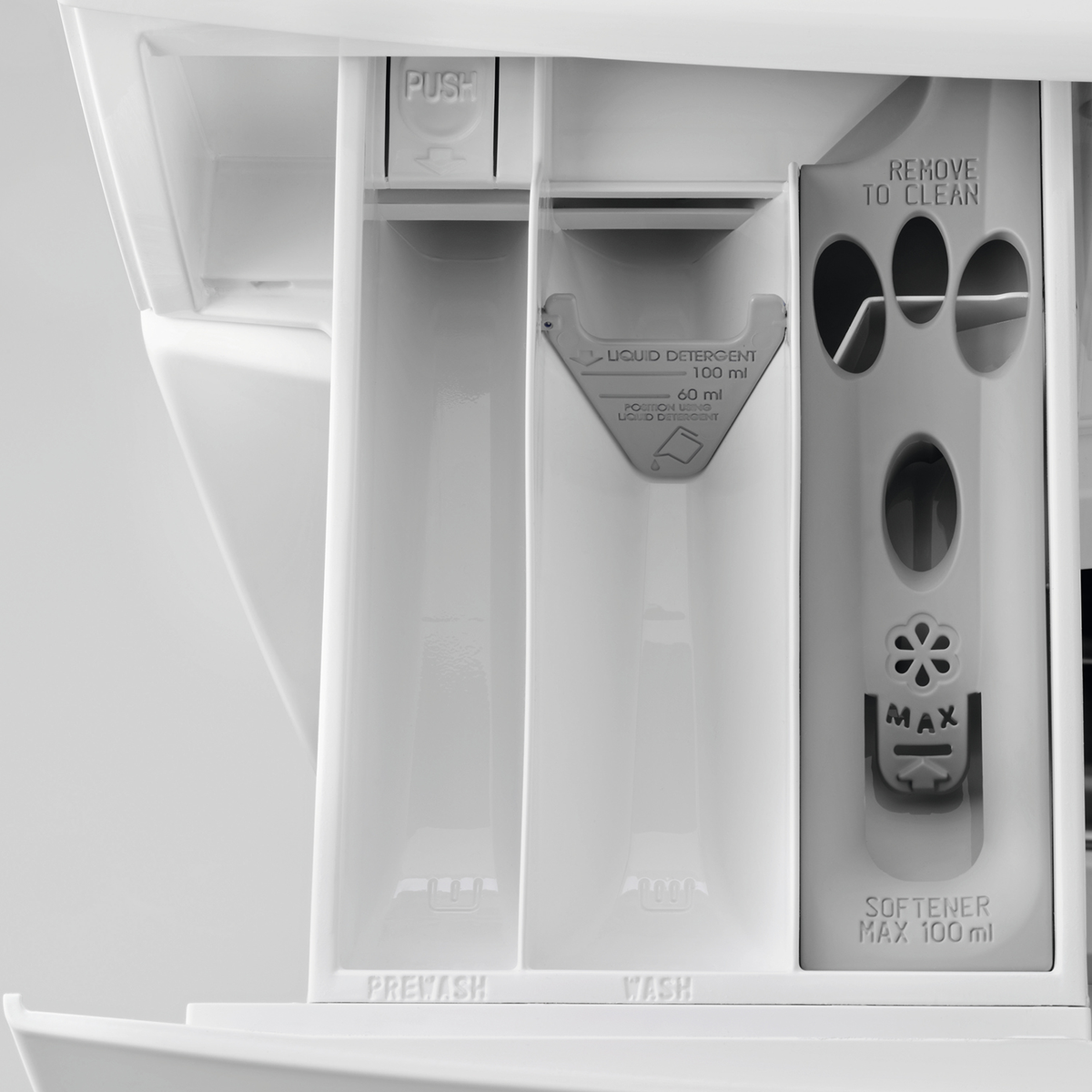 Dispenser detersivo con scomparti prelavaggio, lavaggio e ammorbidente, tutto bianco.