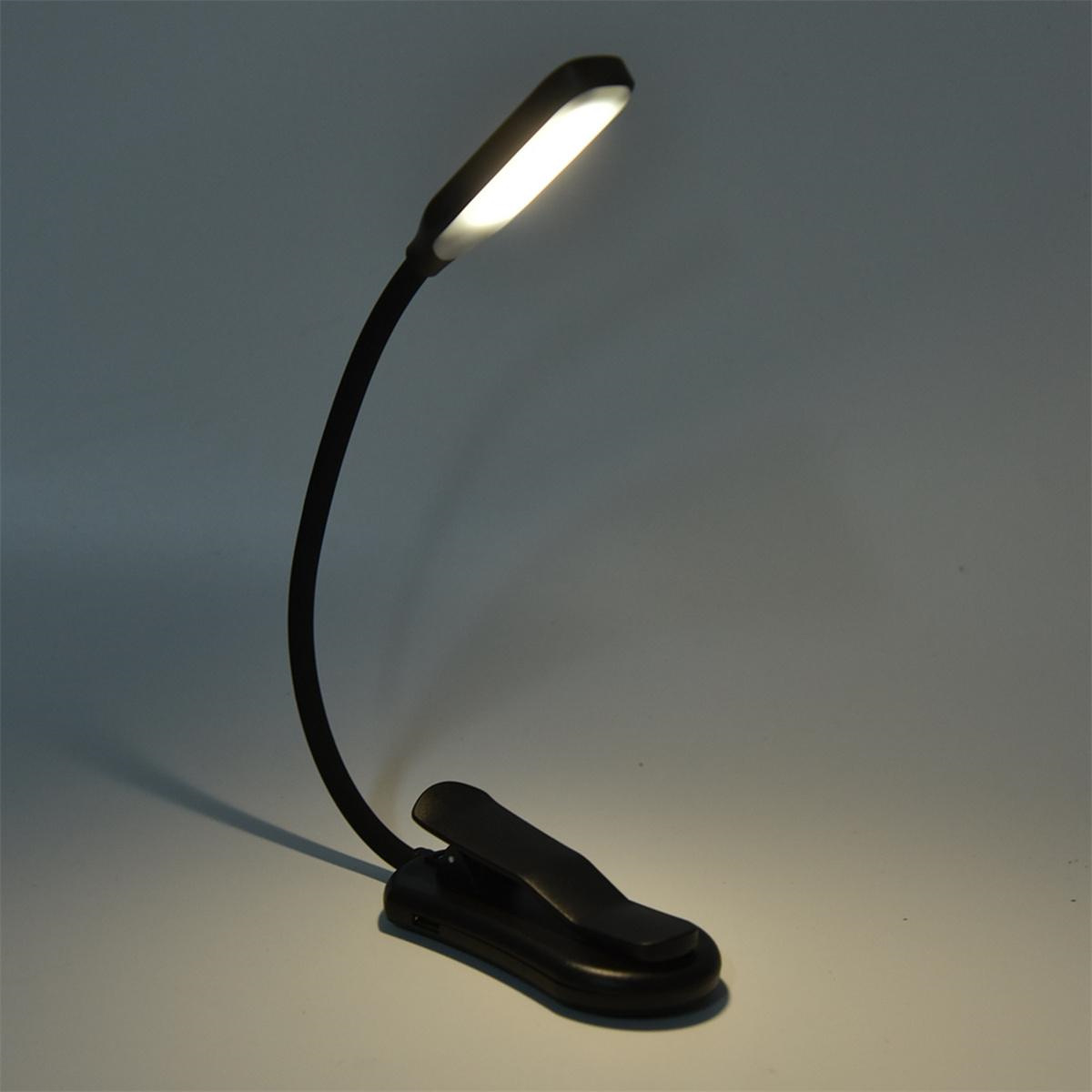 Schwarze Leselampe mit flexiblem Hals und Clip.