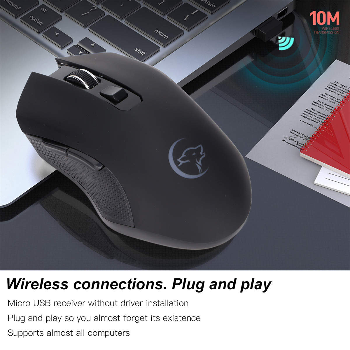 Schwarze kabellose Maus auf einem Schreibtisch mit Laptop und Text 'Wireless connections'.