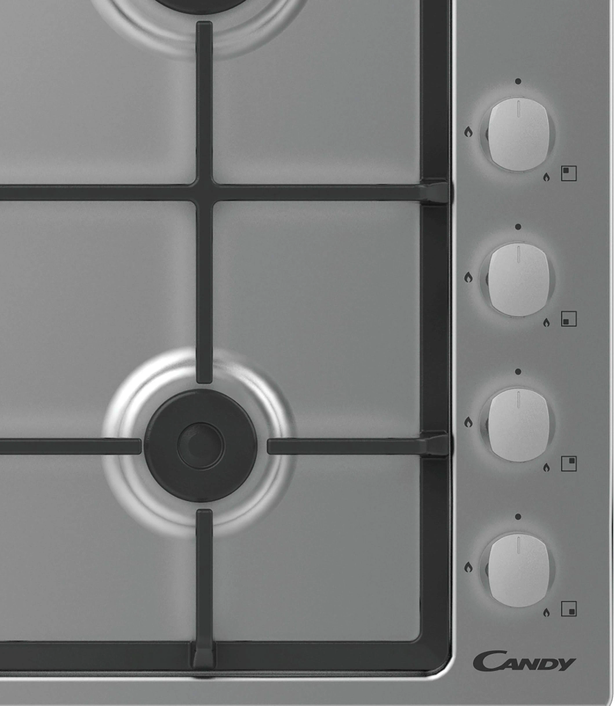 Zbliżenie płyty gazowej Candy, pokazujące palniki, pokrętła i logo Candy.