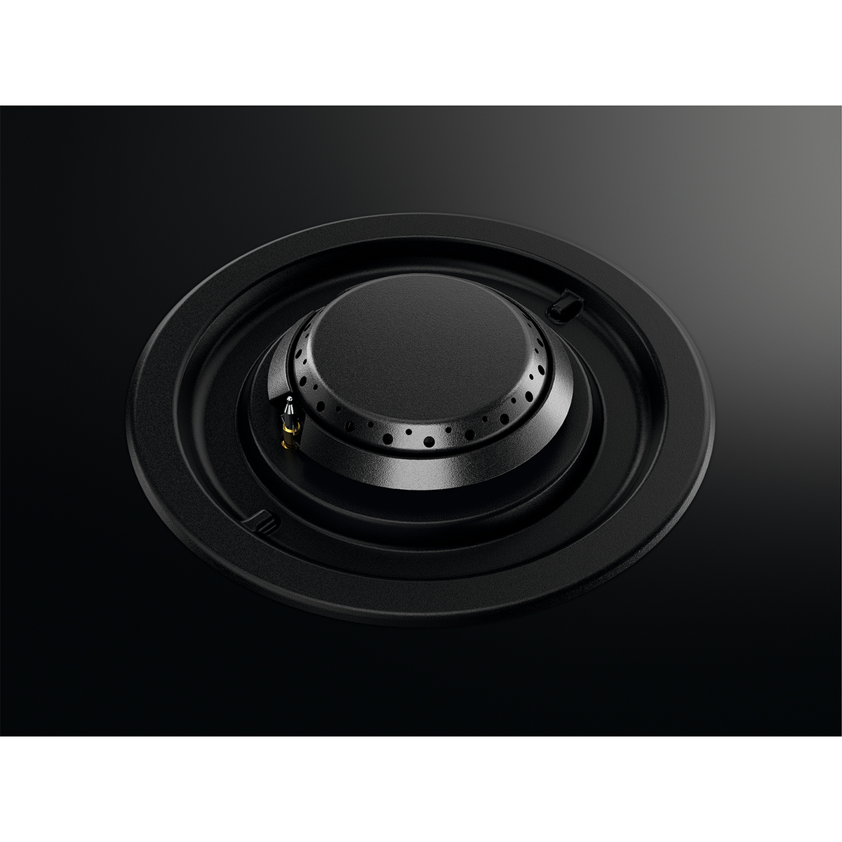 Zbliżenie czarnego palnika kuchenki gazowej, z centralnym pierścieniem płomienia i otaczającą podstawą.