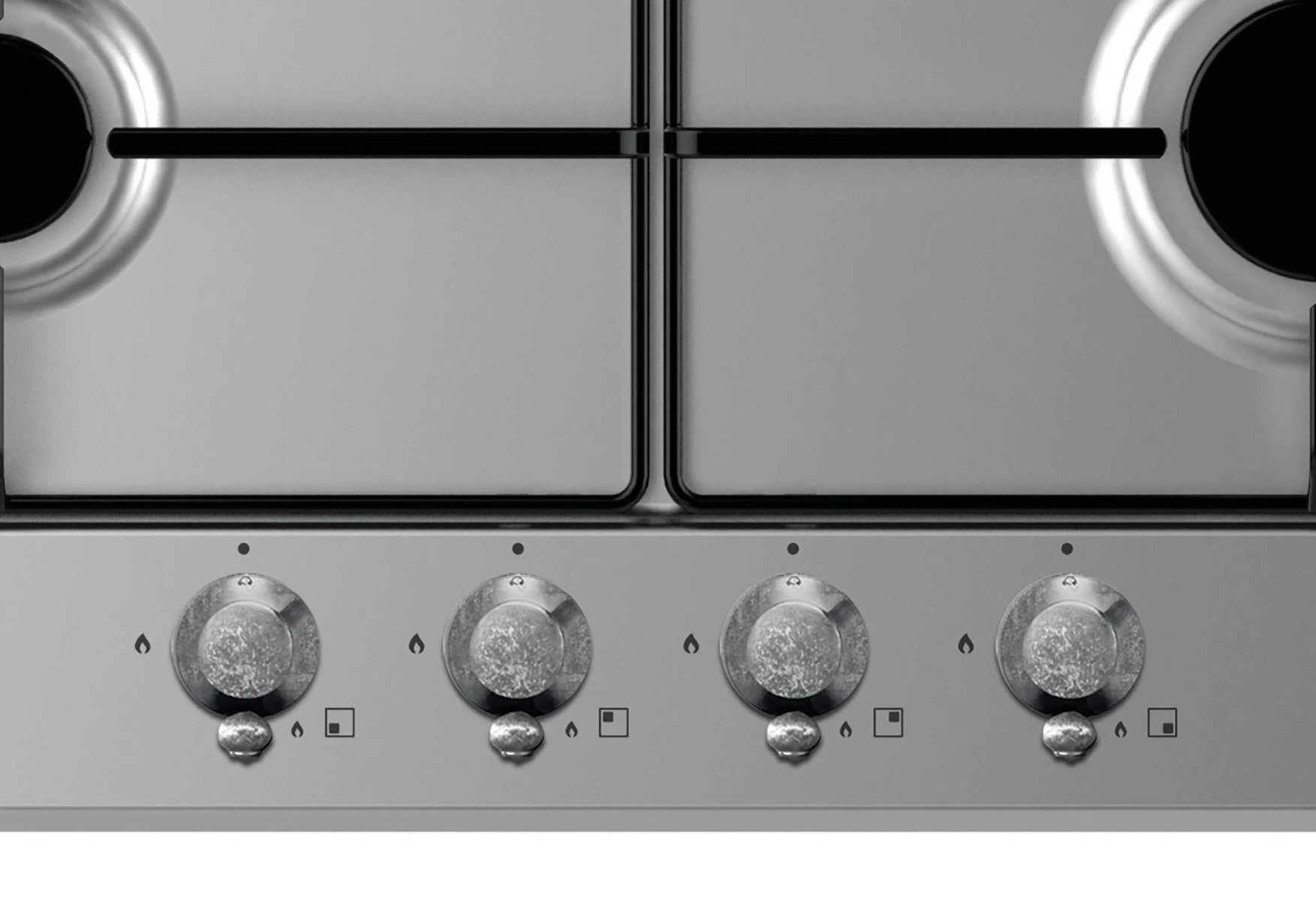 Zbliżenie na kuchenkę gazową ze stali nierdzewnej z czterema palnikami i pokrętłami.