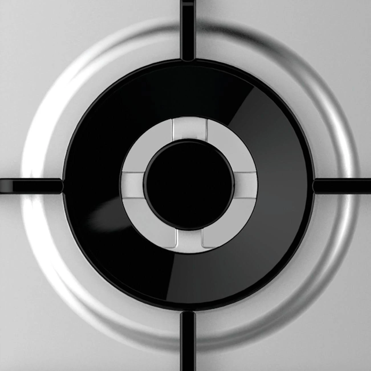 Zbliżenie palnika płyty grzewczej, pokazujące palnik i otaczającą powierzchnię.