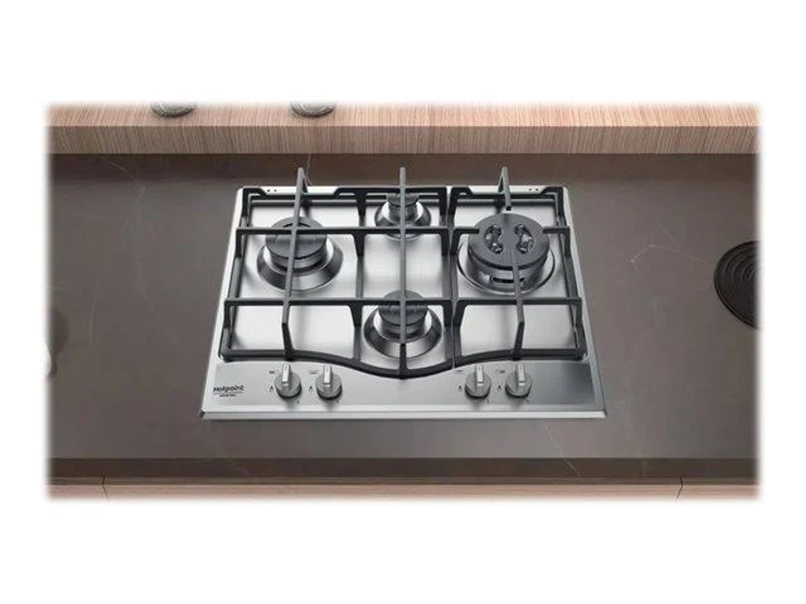 Gazowa płyta grzewcza ze stali nierdzewnej z czterema palnikami i pokrętłami. Nowoczesne urządzenie.