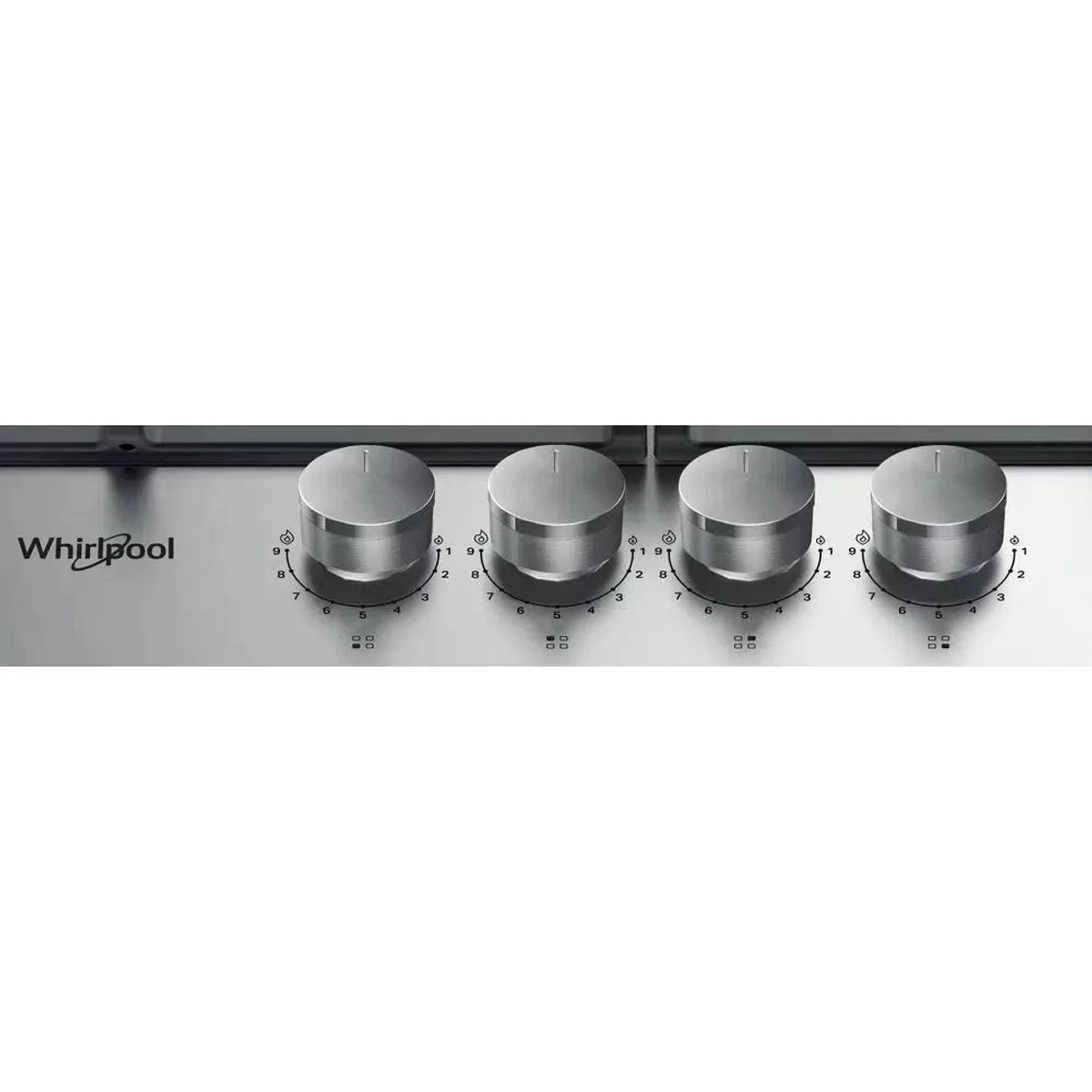 Primer plano de los controles de la encimera Whirlpool. Perillas plateadas con marcas numéricas visibles.