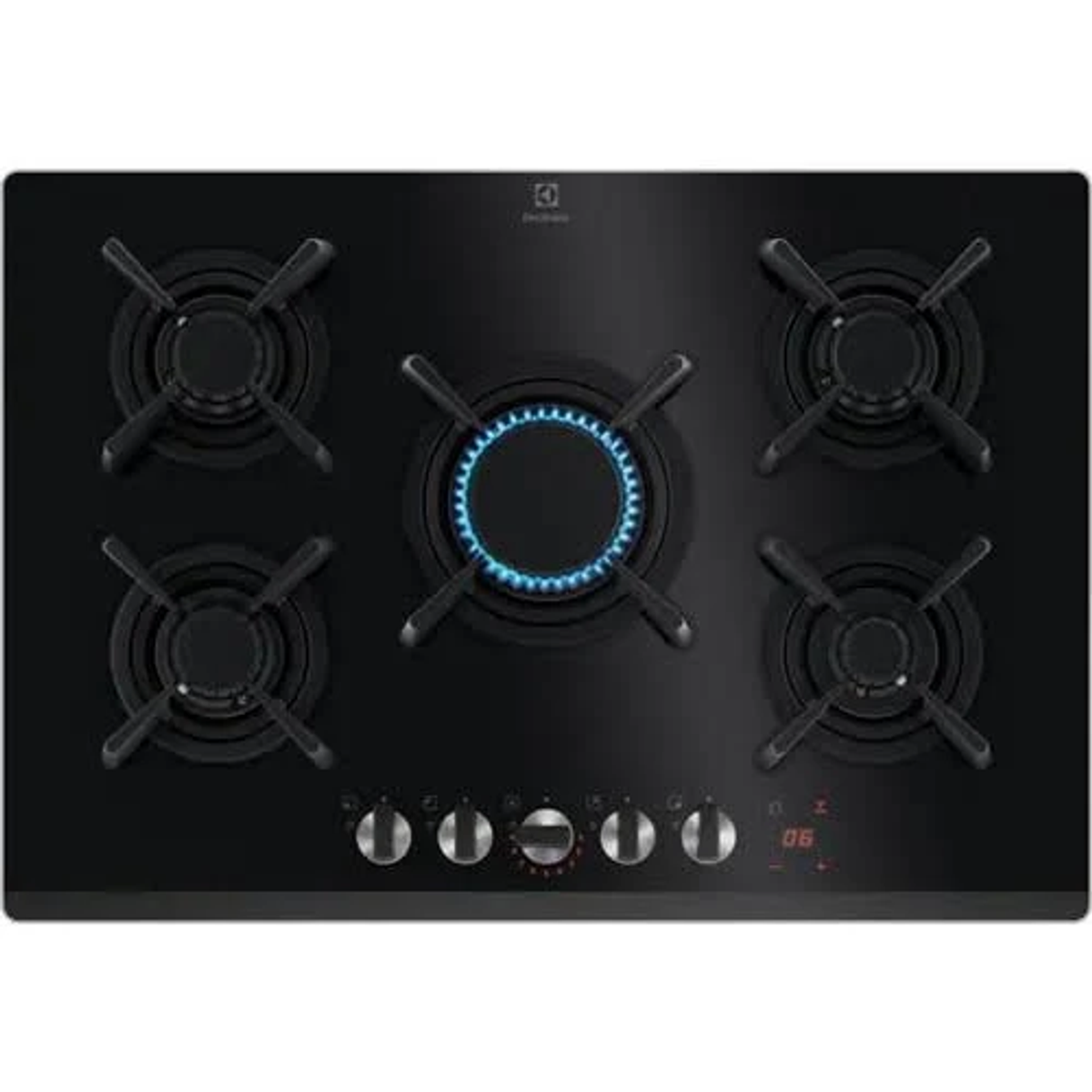 Cocina de gas negra con cinco quemadores, cuatro con parrillas en cruz y uno central.