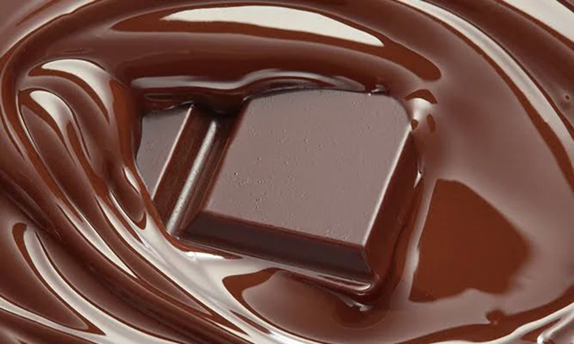 Czarna płyta indukcyjna Smeg z czerwonym wyświetlaczem cyfrowym na blacie.