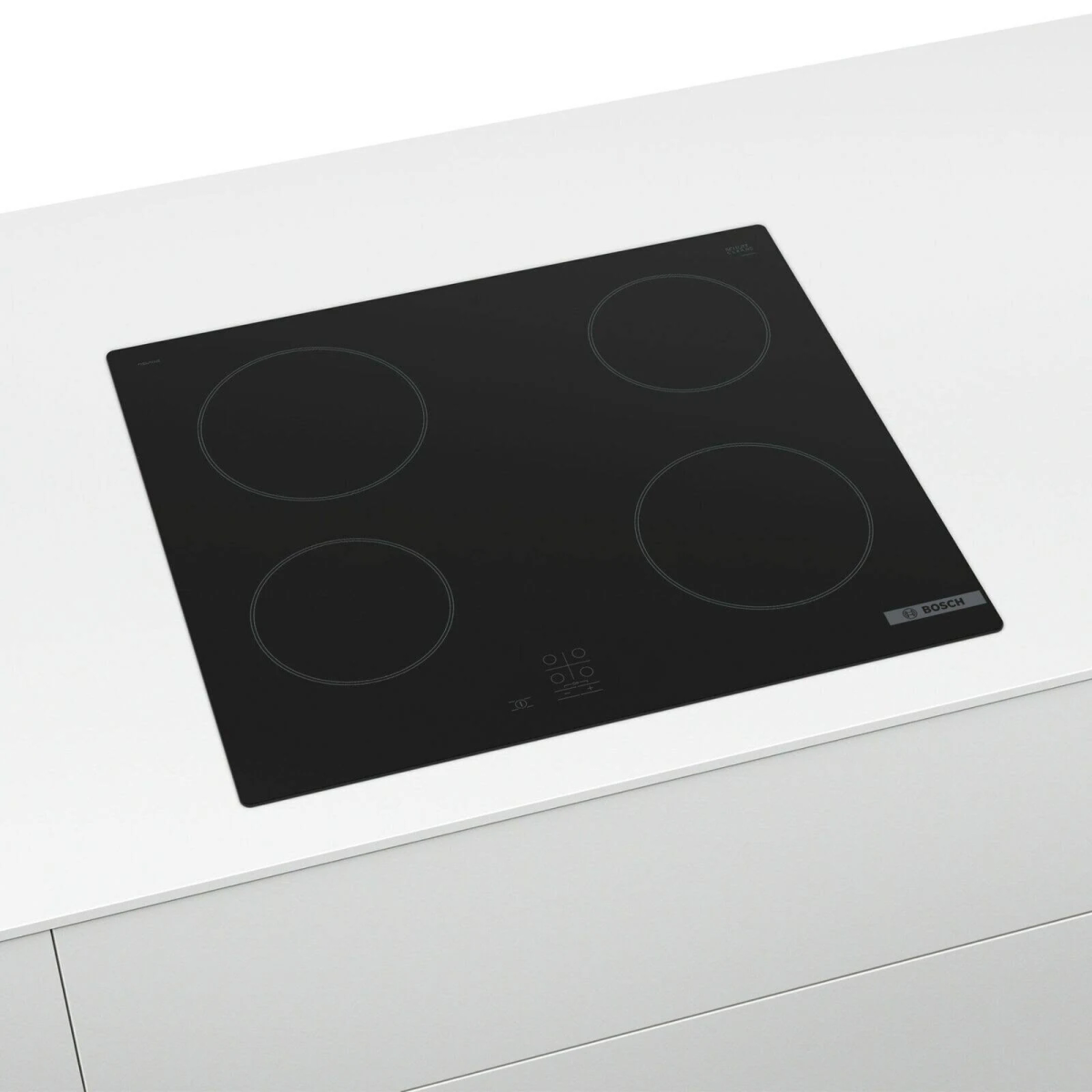 Piano cottura nero con quattro fuochi circolari, su piano bianco. Logo Bosch a destra.