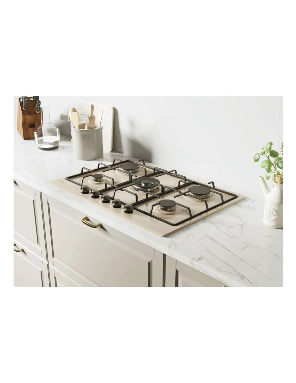 Wbudowana płyta gazowa z czterema palnikami na marmurowym blacie.