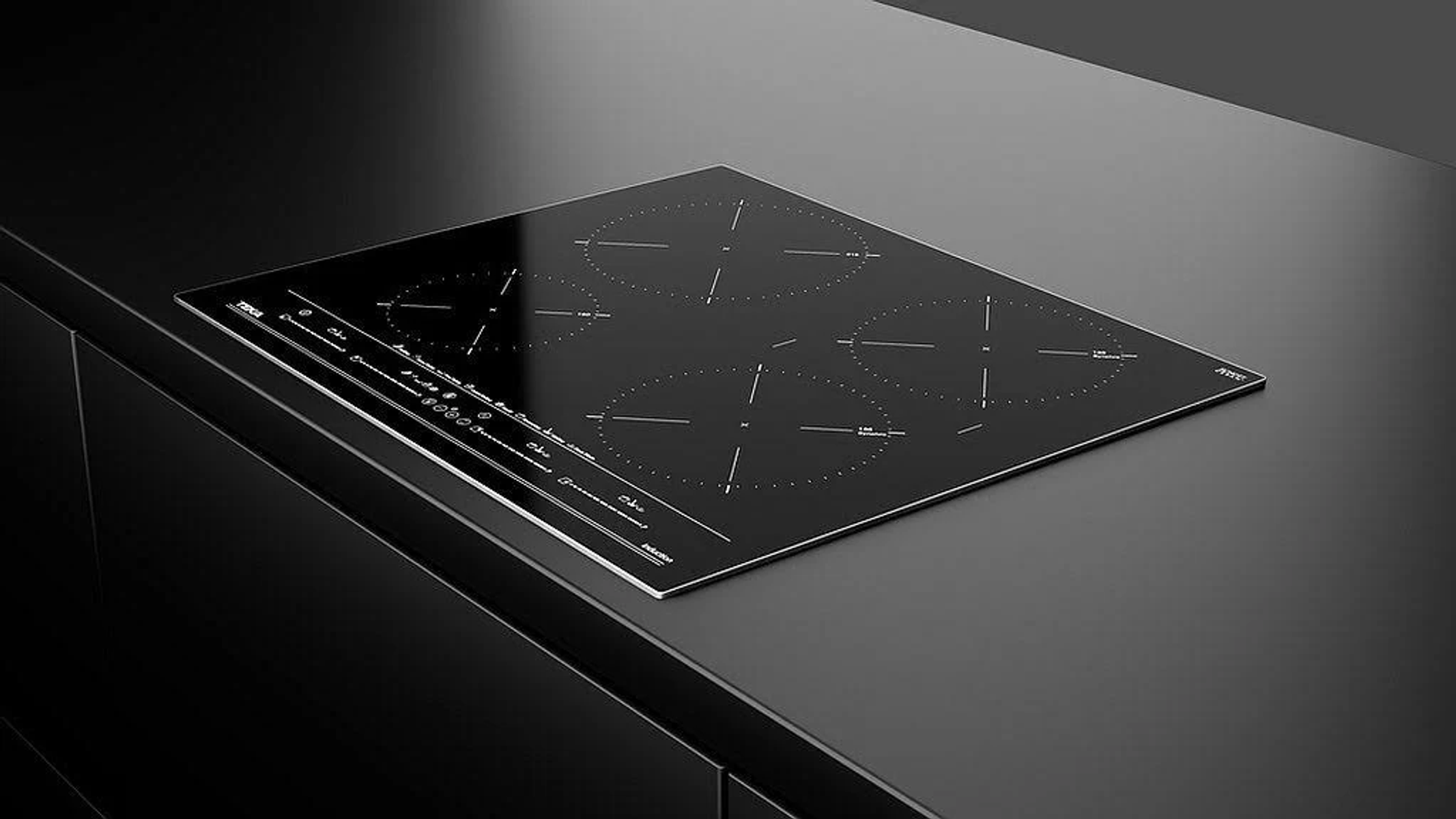 Encimera negra elegante sobre encimera negra, diseño de cocina moderno.