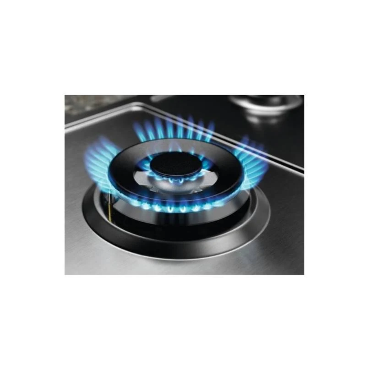 Zbliżenie palnika gazowego z niebieskimi płomieniami.