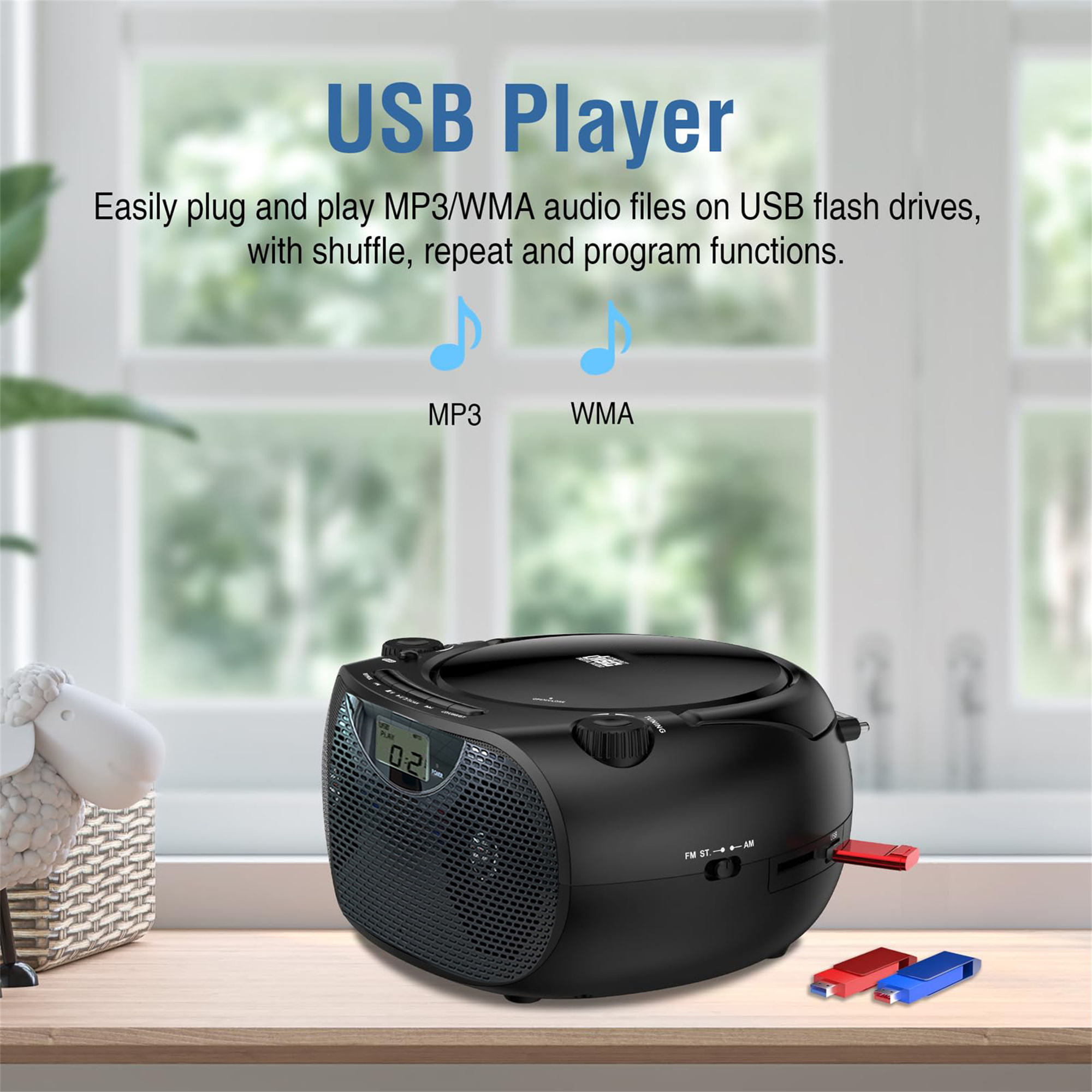 Ein schwarzes Radio mit USB-Anschluss und zwei USB-Sticks.