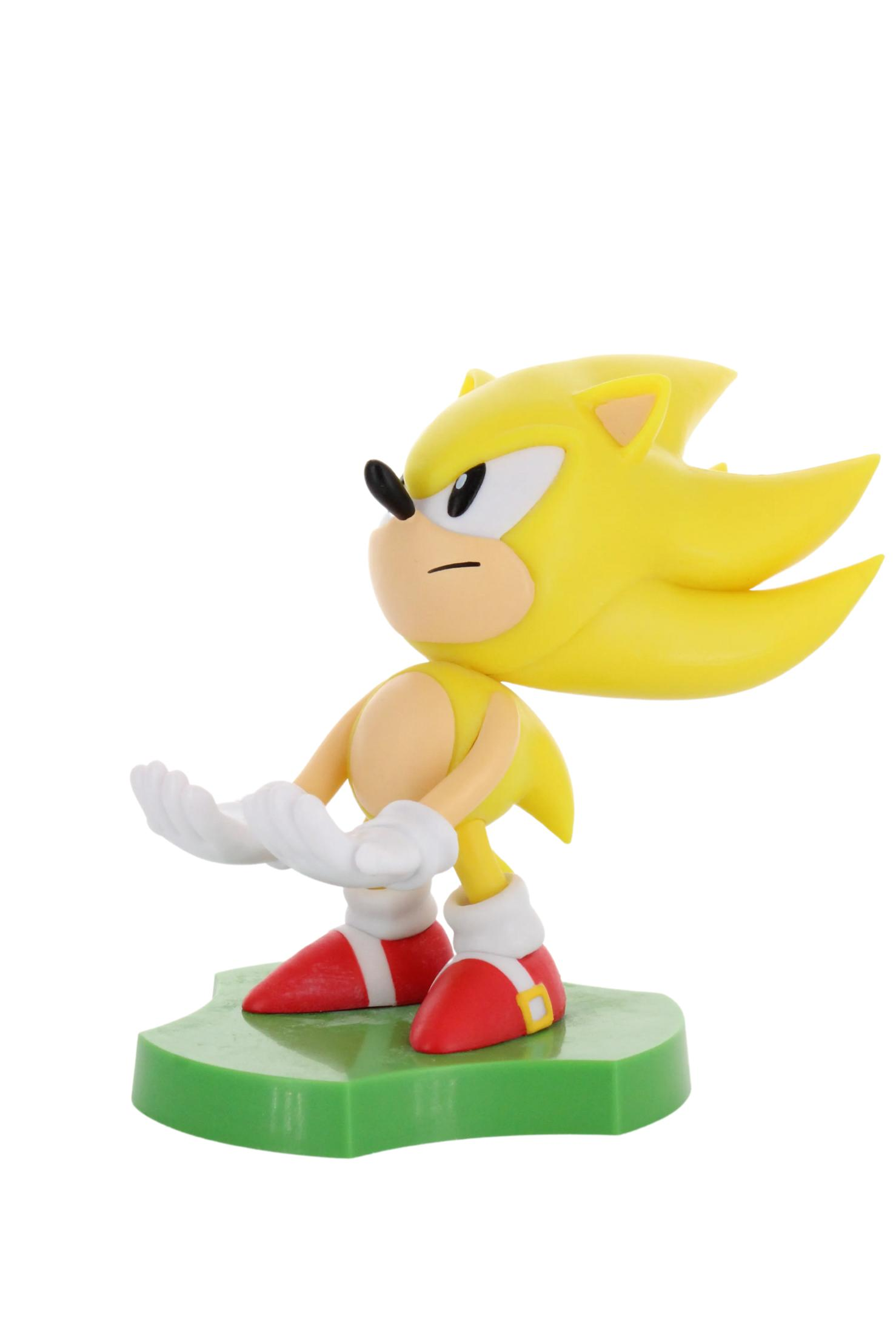 Figura di Super Sonic the Hedgehog. Corpo giallo con scarpe rosse e base verde.
