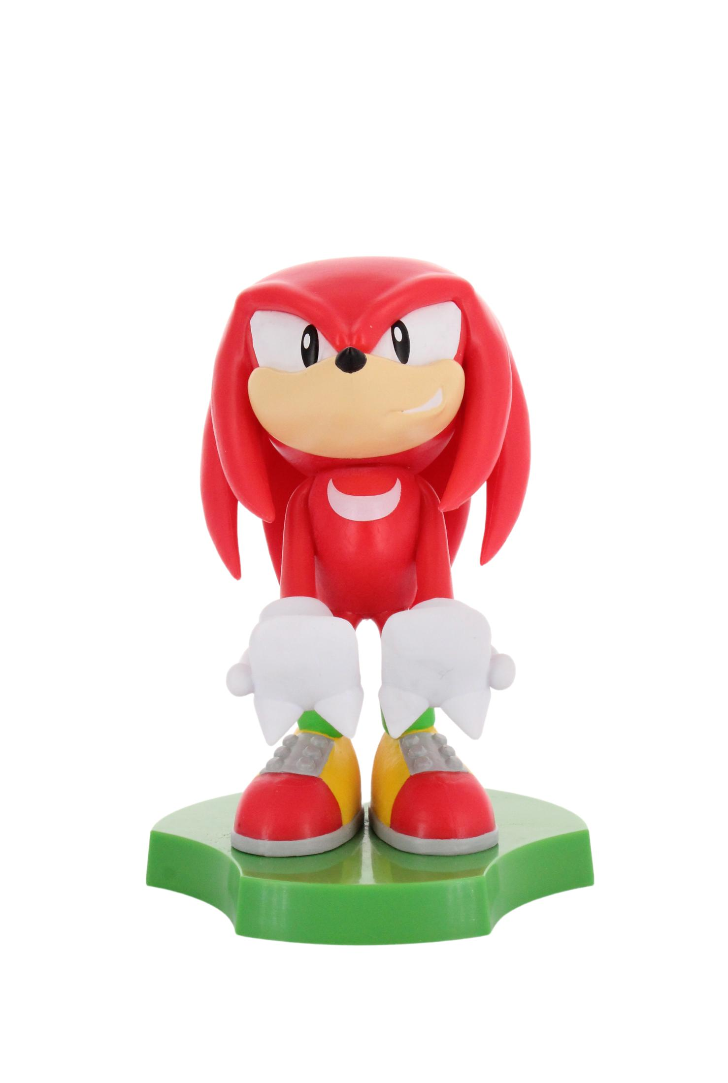 Figurka Knuckles, czerwono-biała, na zielonej podstawie.