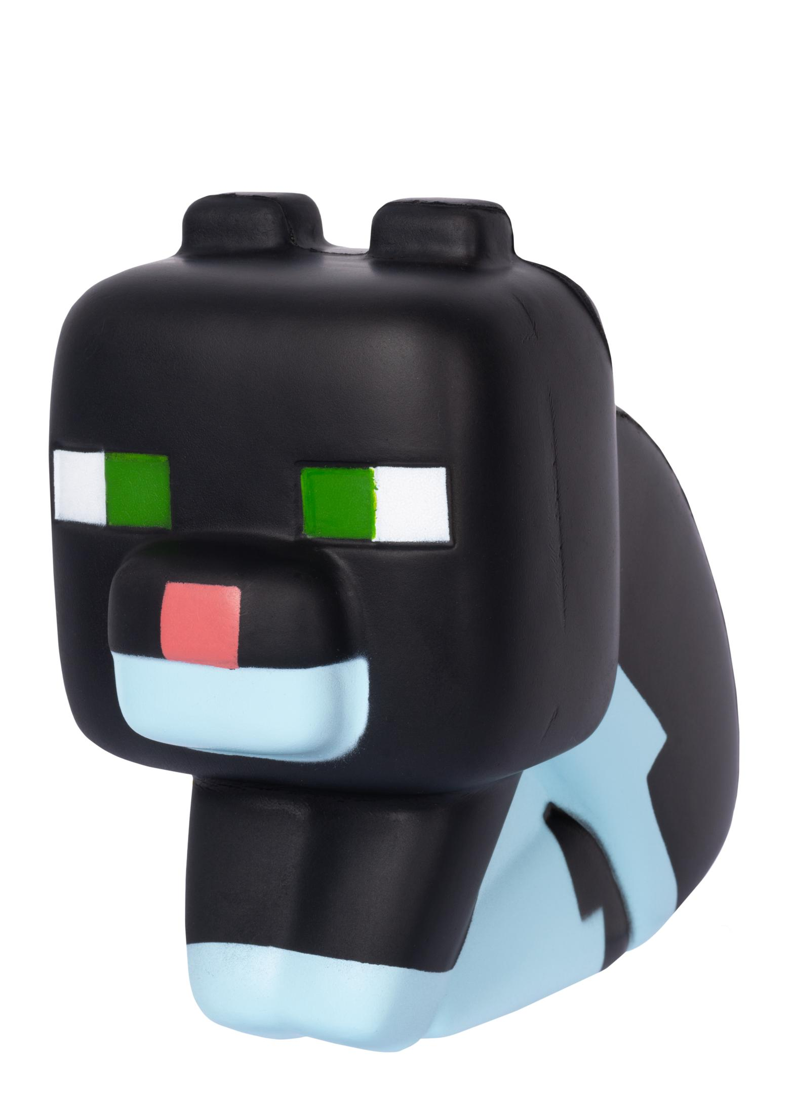 Ein schwarzes Minecraft Kuh-Spielzeug mit blauen und hellblauen Markierungen. Grüne Augen.