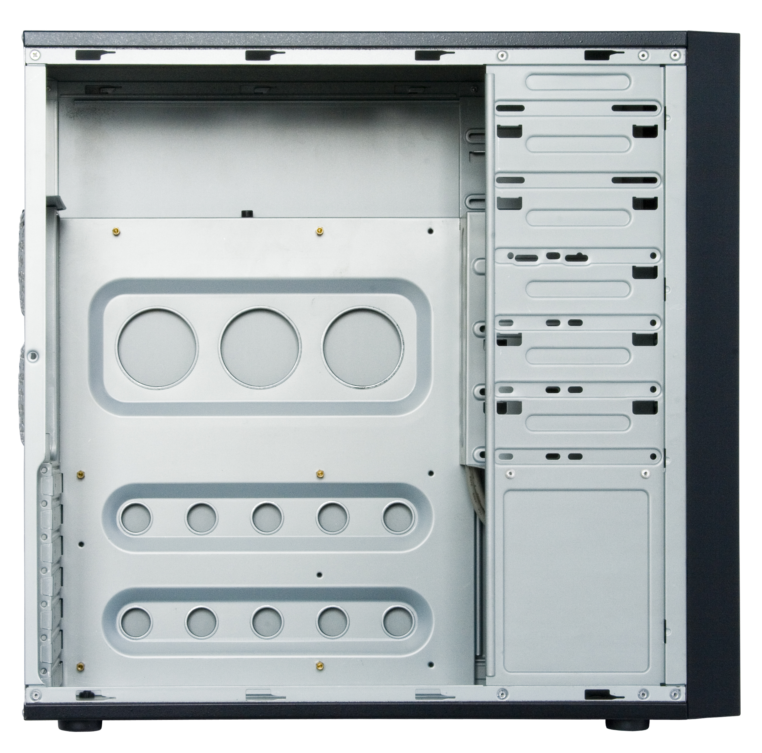 Widok wewnątrz obudowy komputera stacjonarnego, pokazujący różne przegrody i strukturę wewnętrzną.