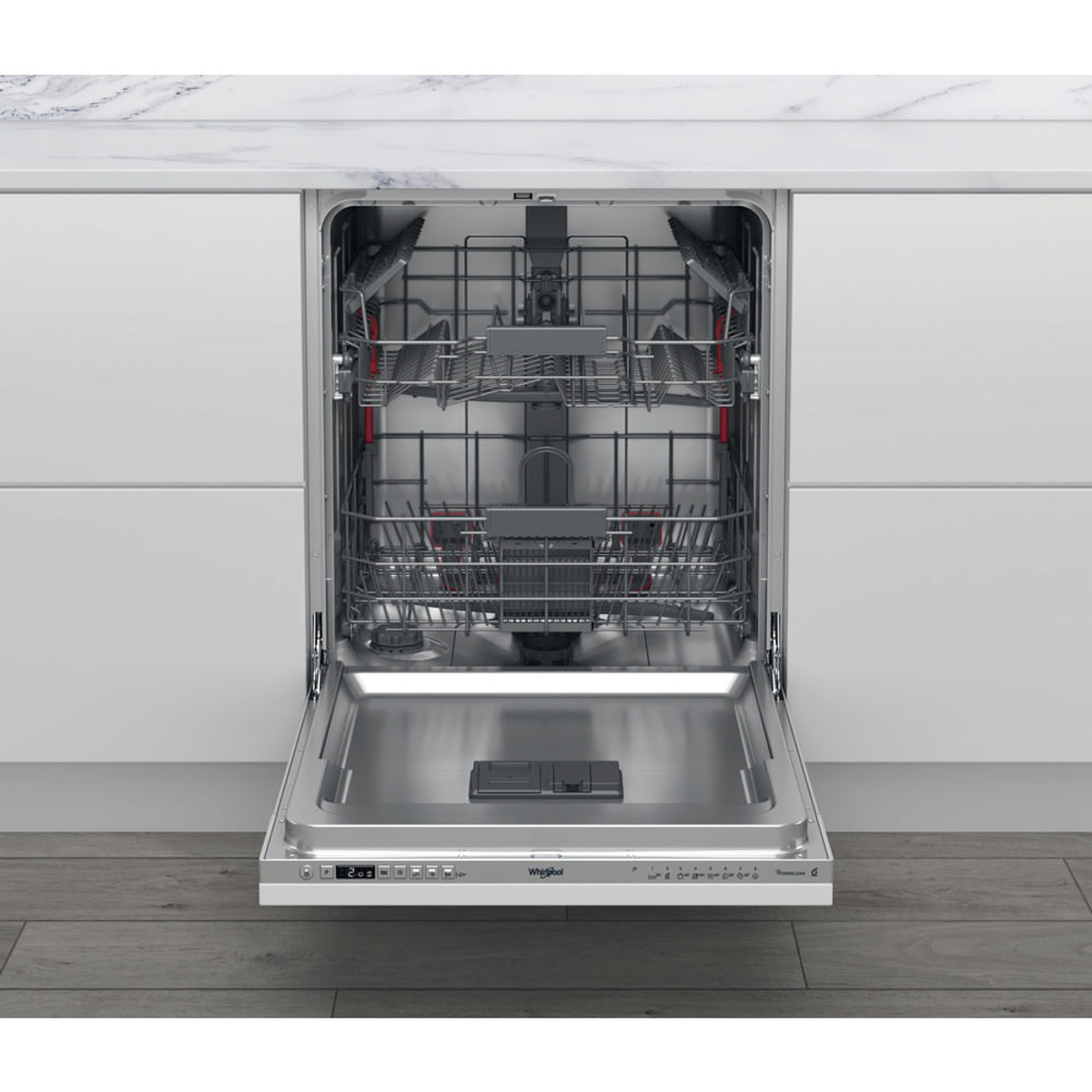Lavastoviglie aperta con cestelli visibili. Interno in acciaio inox, piano di lavoro bianco e pavimento in legno.
