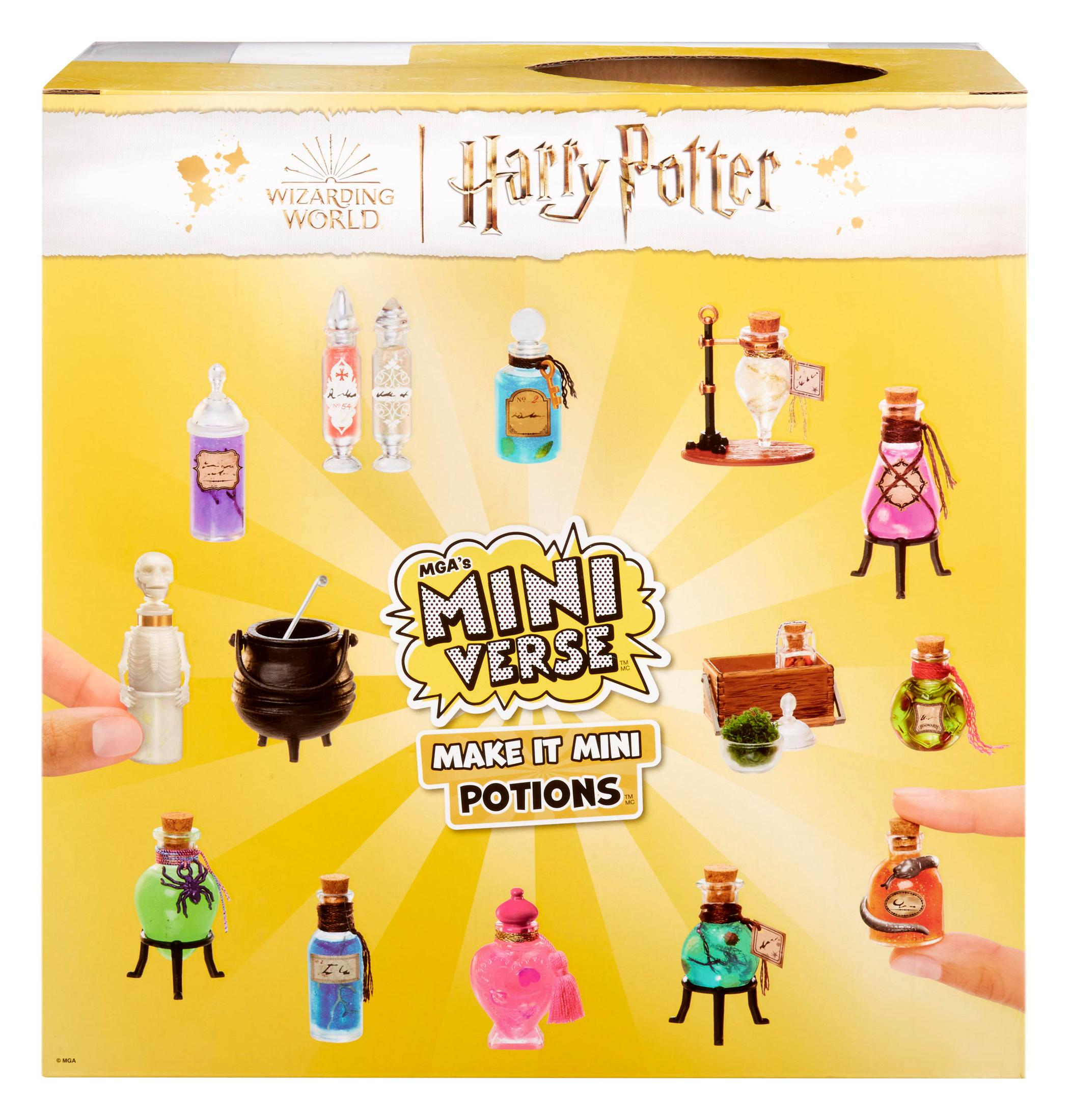 Scatola con varie bottiglie di pozioni dal mondo magico di Harry Potter. Una mano sta versando una pozione.