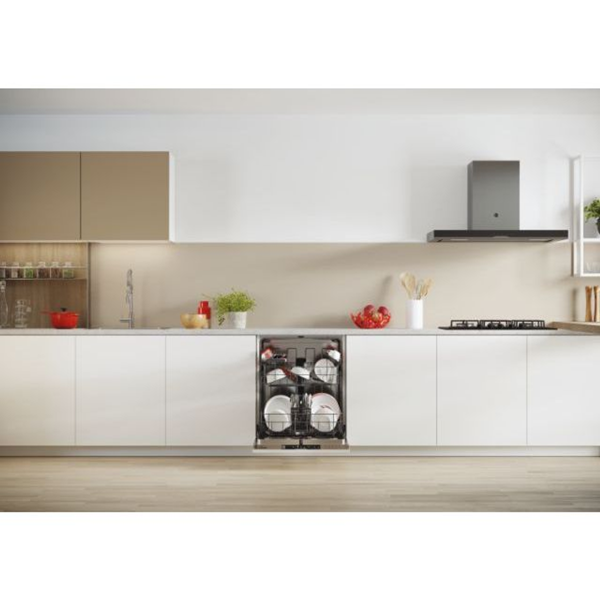 Una cucina moderna con mobili bianchi. Una lavastoviglie è aperta con piatti all'interno.