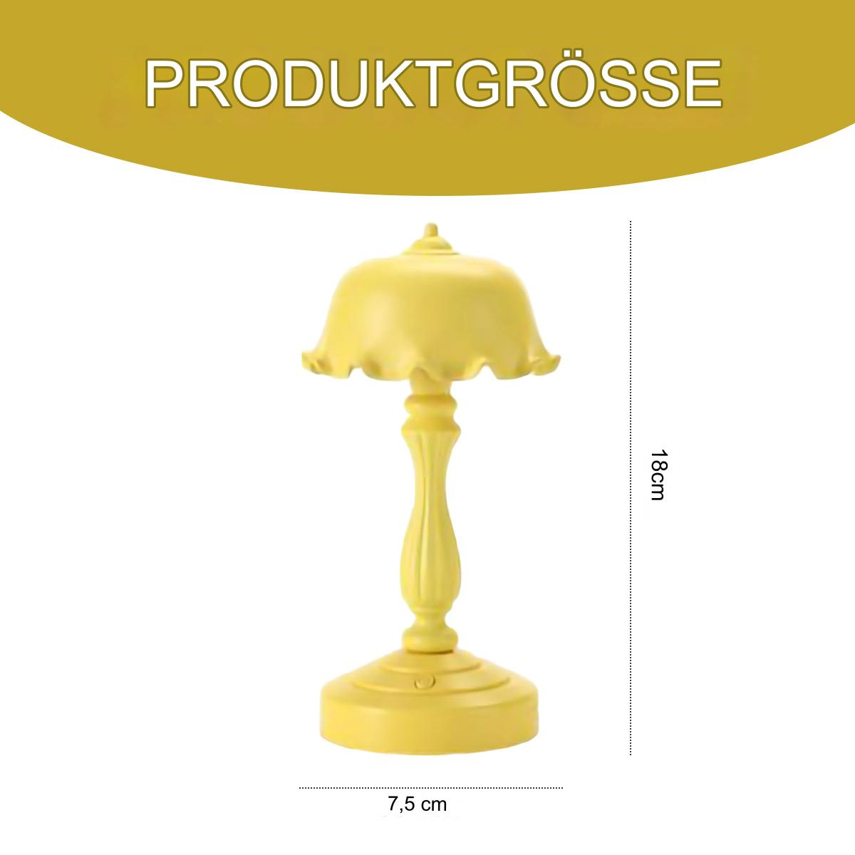 Gelbe Tischlampe mit Abmessungen. Die Lampe steht auf weißem Hintergrund.