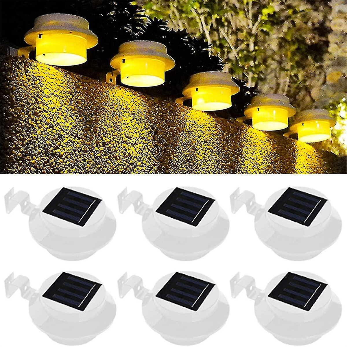 Solarbetriebene Außenleuchten an einer Steinmauer. Sechs weiße Lichter mit schwarzen Solarpanels.