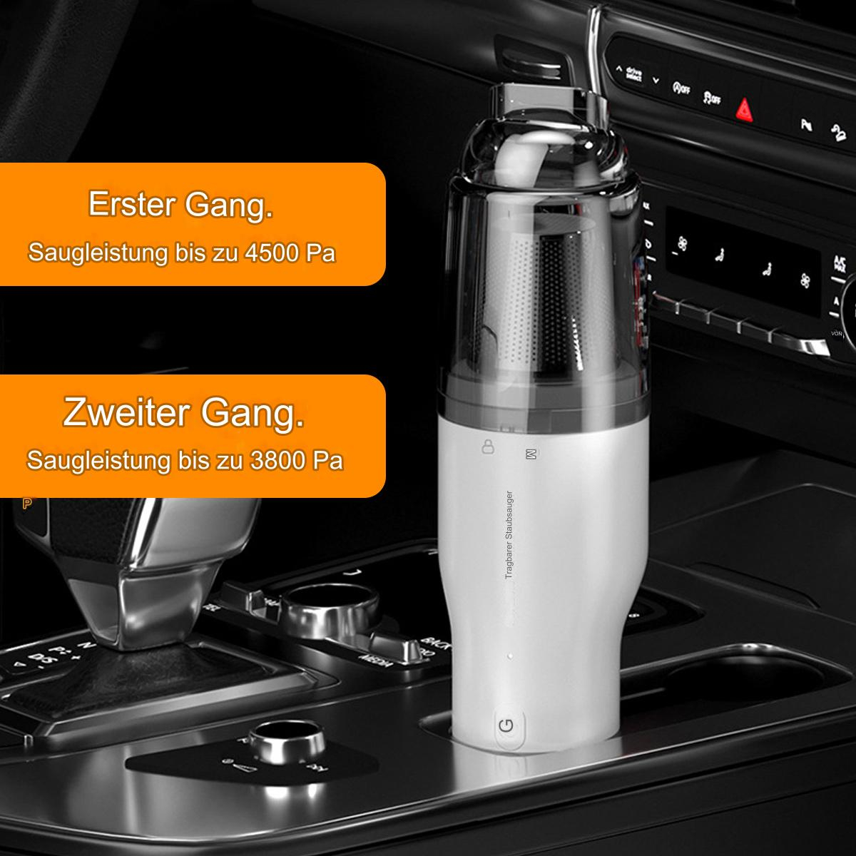 Weißer und silberner tragbarer Staubsauger in der Mittelkonsole eines Autos.