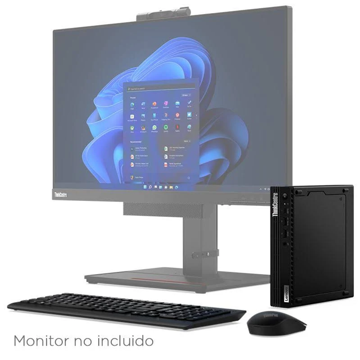 Konfiguracja komputera z monitorem, wieżą, klawiaturą i myszą na białej powierzchni.