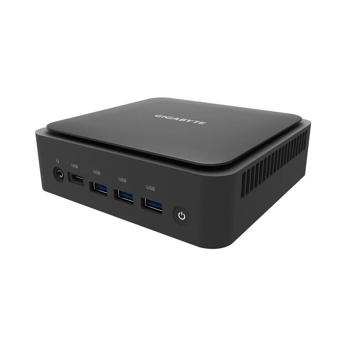 Mini PC negro con puertos USB. La parte superior es plana y los lados son curvos.