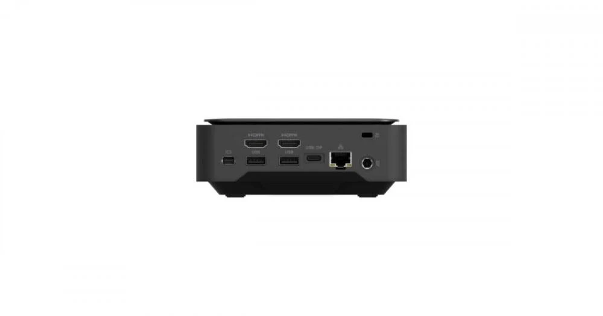 La parte trasera de una pequeña computadora negra con múltiples puertos. Los puertos incluyen HDMI, USB y Ethernet.
