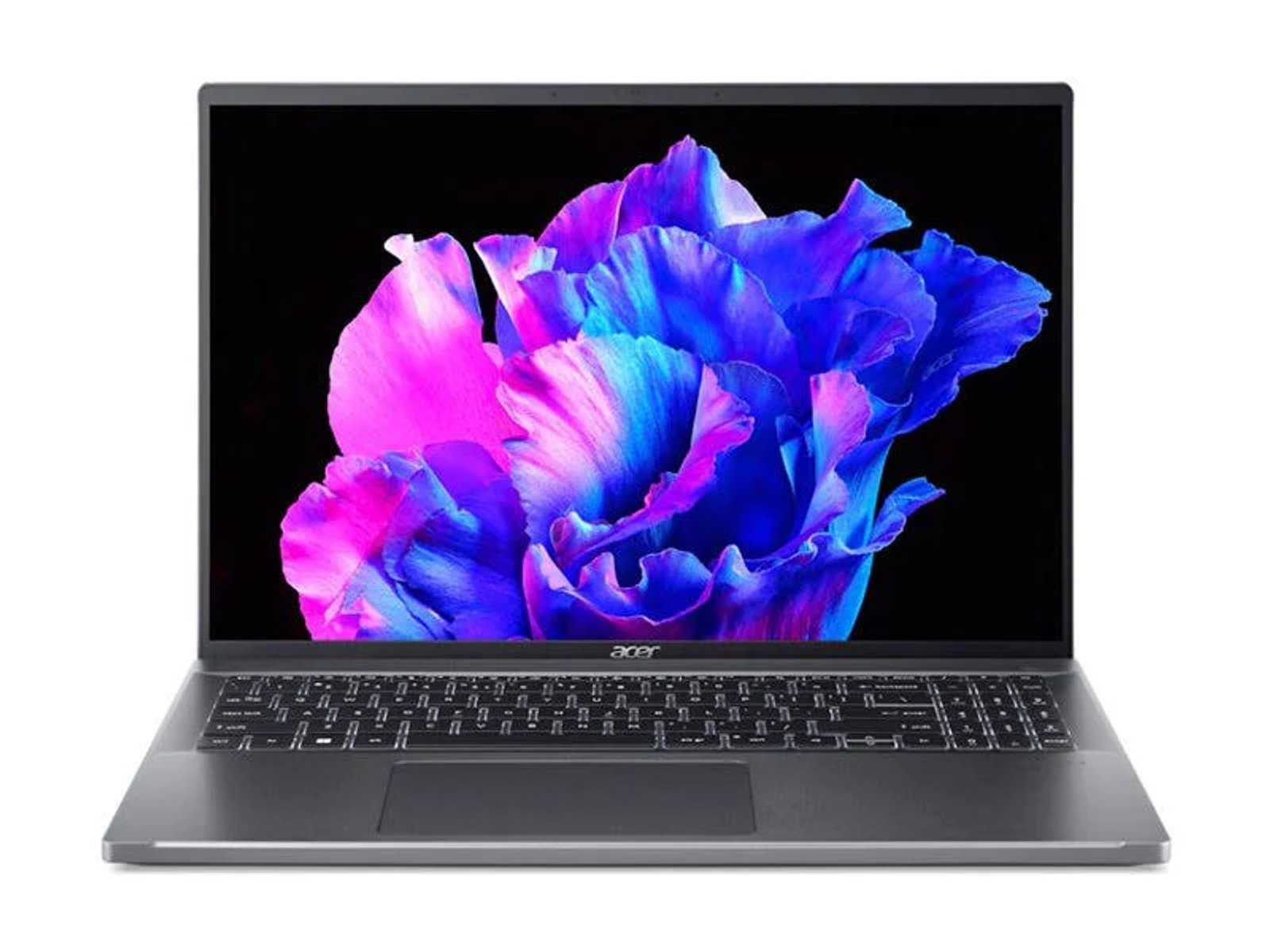 Laptop con un vivace display floreale sullo schermo. La tastiera è visibile. Sfondo scuro.