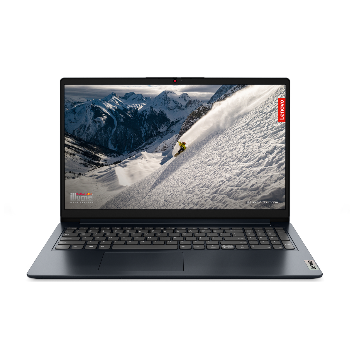 Czarny laptop otwarty na białym tle. Ekran pokazuje zaśnieżony krajobraz górski. Logo Lenovo w rogu.