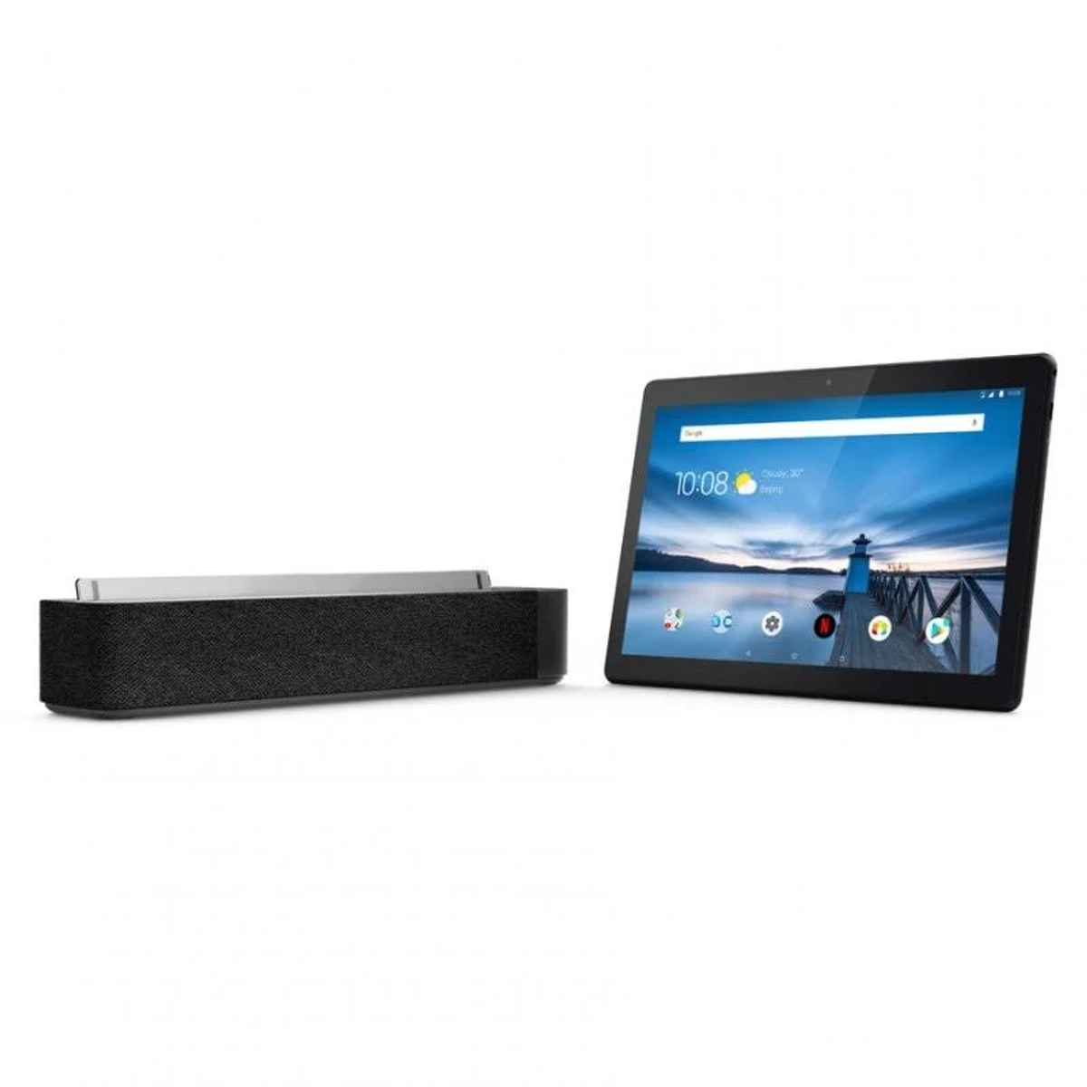 Tablet i głośnik, tablet pokazuje obraz sceny na plaży.