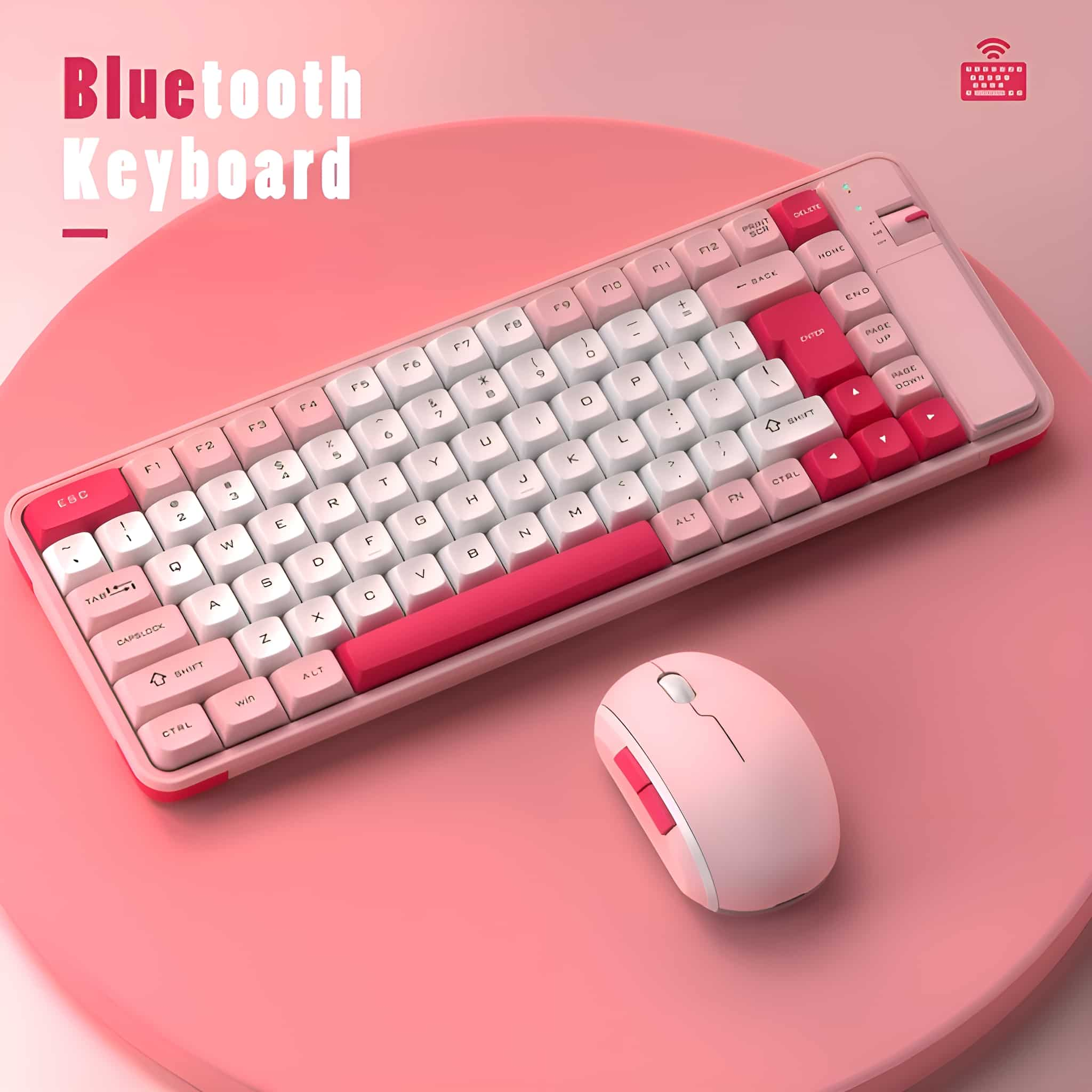 Rosa Bluetooth-Tastatur und Maus-Set auf rosa Oberfläche, mit weißen Tasten und rosa Akzenten.