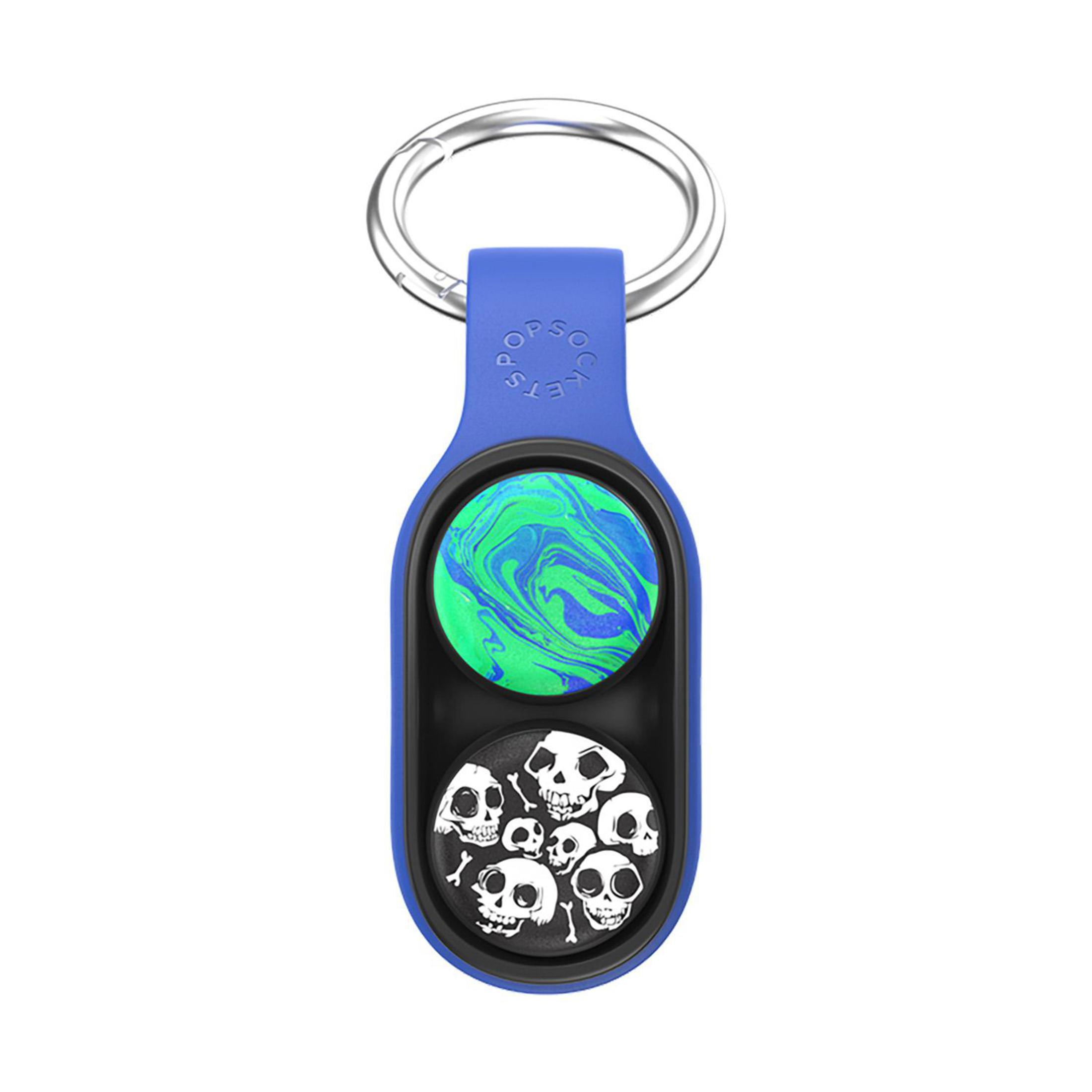 Portachiavi blu con due inserti. Uno con un vortice verde/blu, l'altro teschi su nero. Anello argentato.