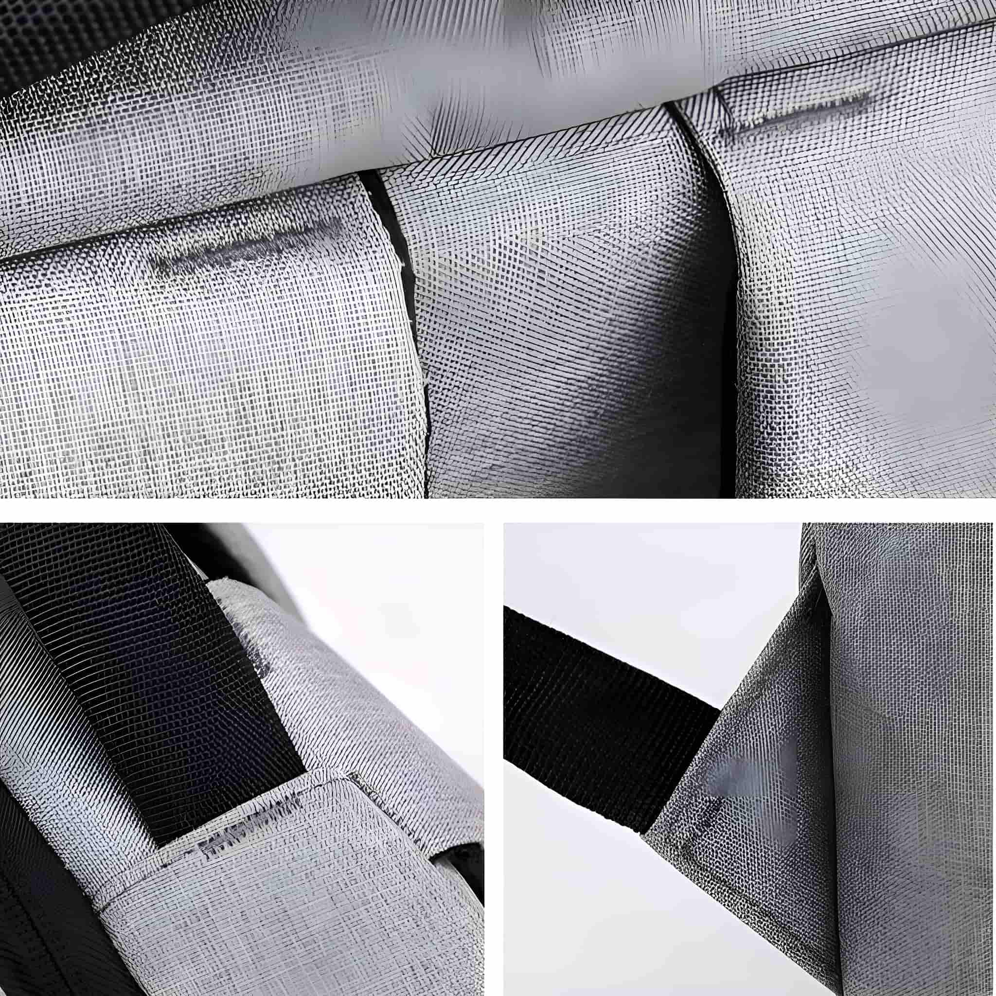 Nahaufnahme von grauem Material mit mehreren Falten. Textur ist ein feines Netz.