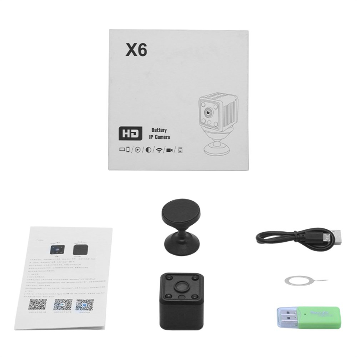 Eine Mini-IP-Kamera, Zubehör und Anweisungen auf einer weißen Oberfläche.