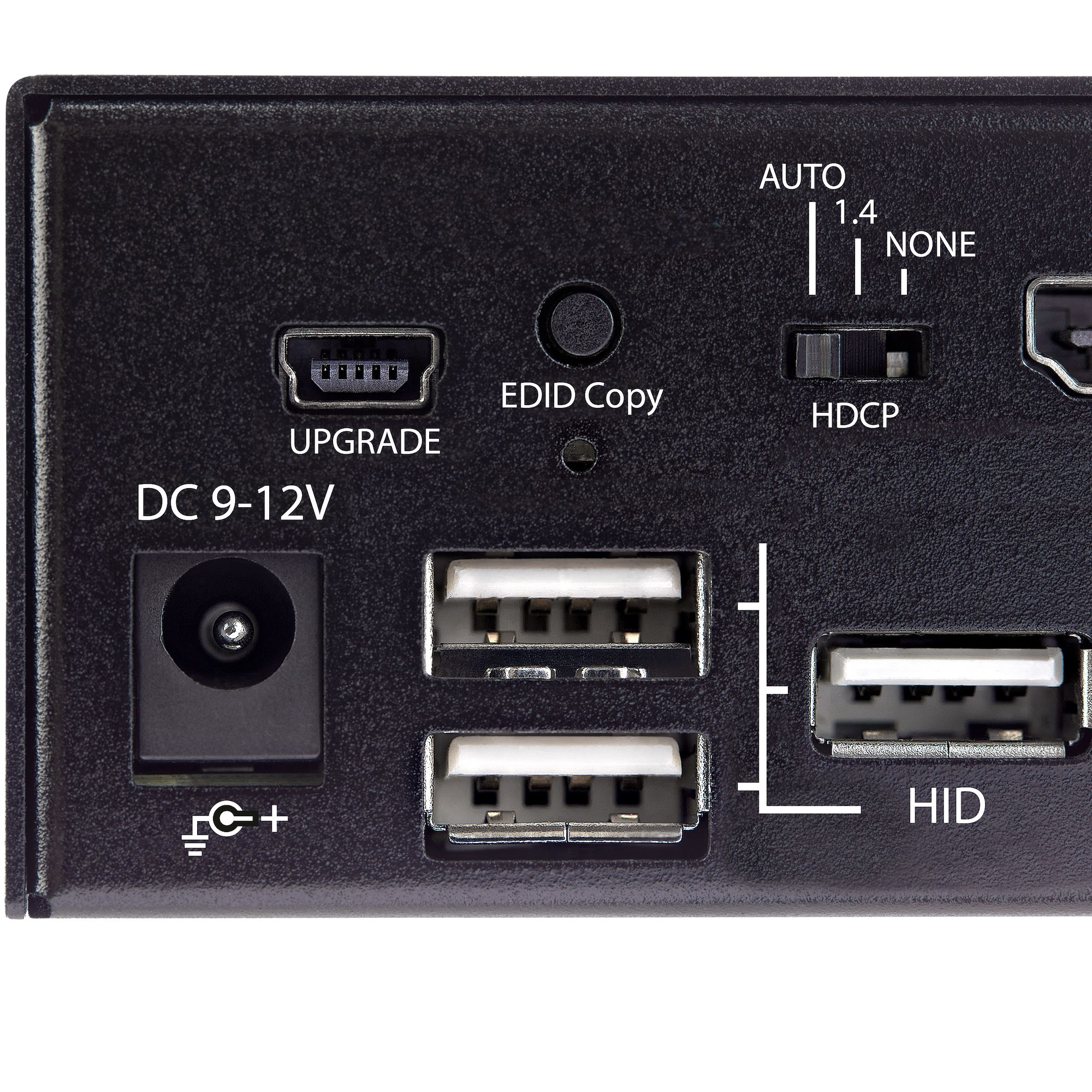 Primer plano de la parte trasera de un dispositivo. Muestra puertos como USB, entrada de alimentación y actualización, con etiquetas.
