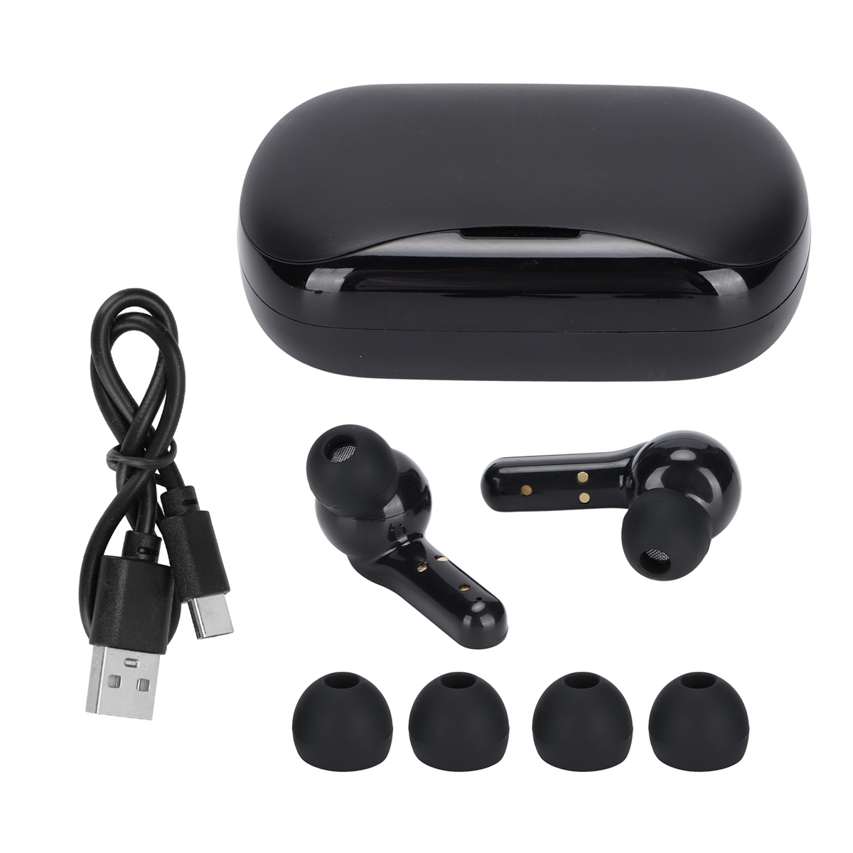 Schwarze kabellose Ohrhörer mit Ladecase, USB-Kabel und zusätzlichen Ohrstöpseln, auf weißer Oberfläche angeordnet.