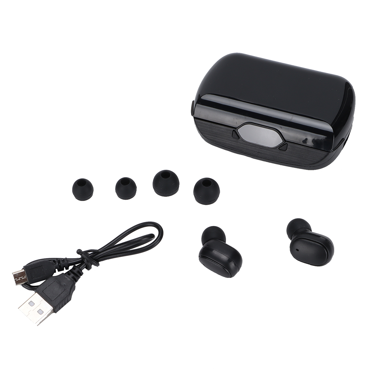 Schwarze Ohrhörer, eine Ladehülle, ein Ladekabel und zusätzliche Ohrstöpsel auf weißer Oberfläche.