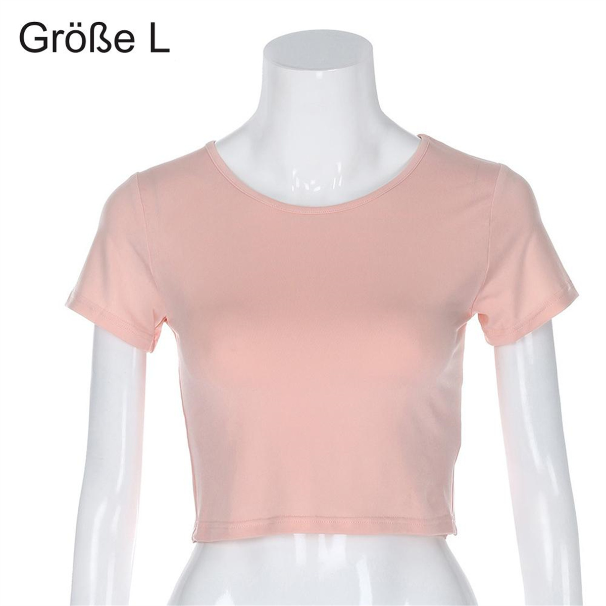 Ein rosa bauchfreies Top auf einer weißen Schaufensterpuppe, mit Text 'Größe L'.