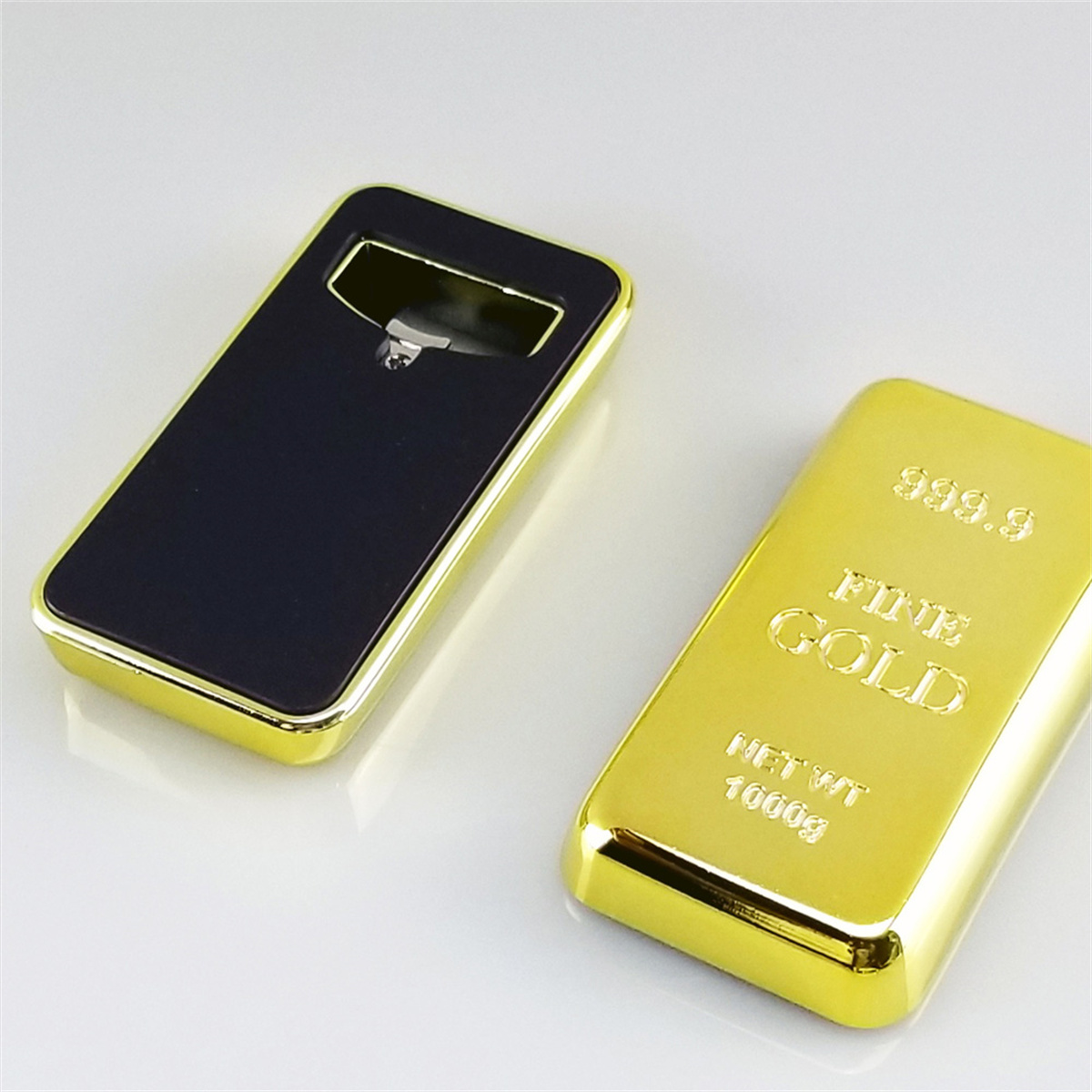 Ein Flaschenöffner in Form eines Goldbarrens und ein Goldbarren.