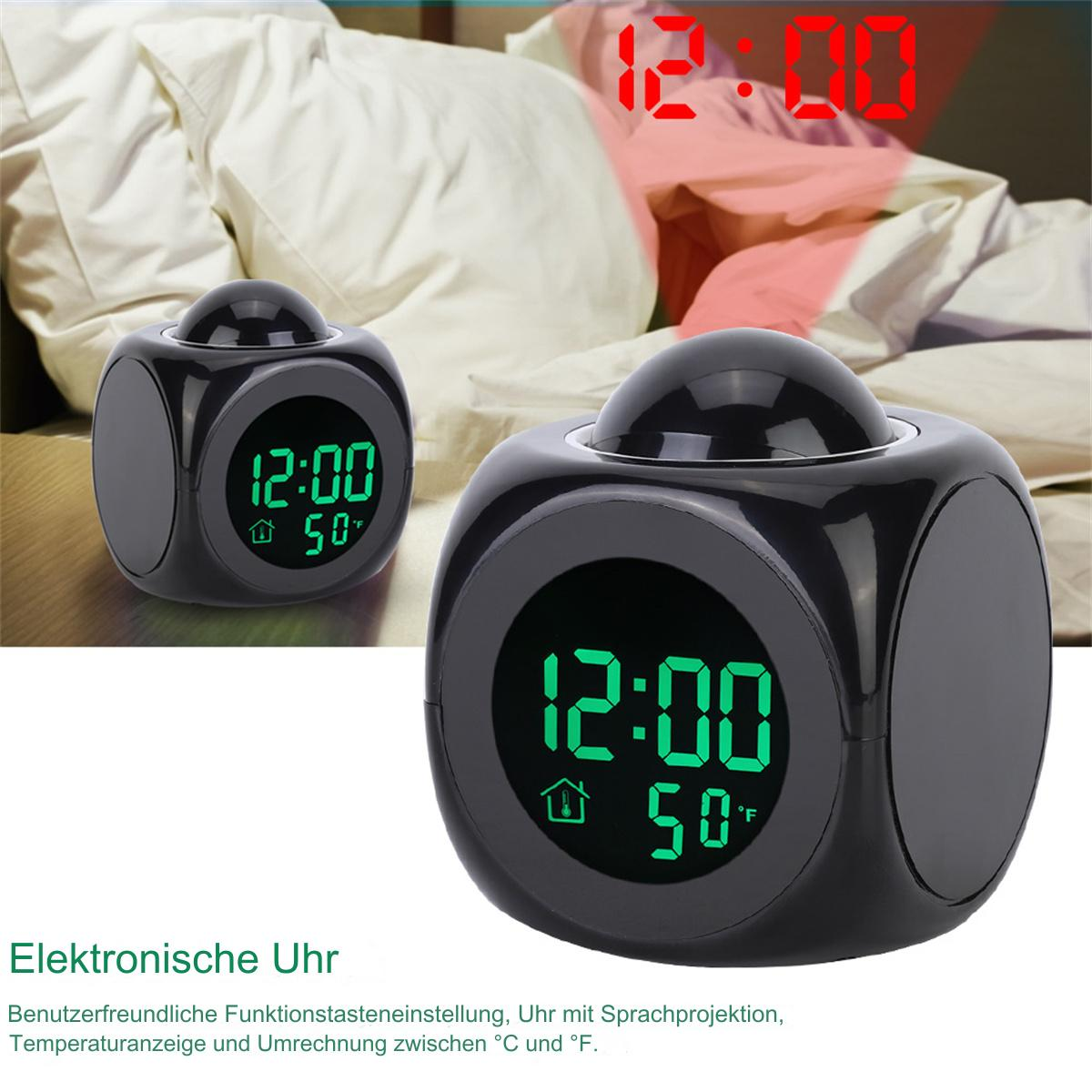 Schwarze Würfel-Wecker, die Zeit und Temperatur anzeigen, mit verschwommenem Hintergrund.