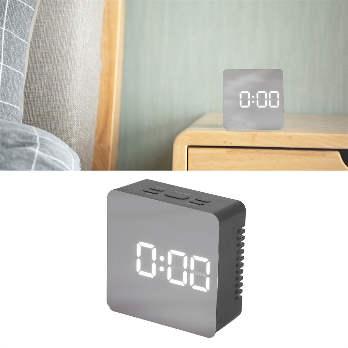Eine Digitaluhr zeigt 0:00 auf einem Tisch. Ein Bett und eine Wand sind im Hintergrund.