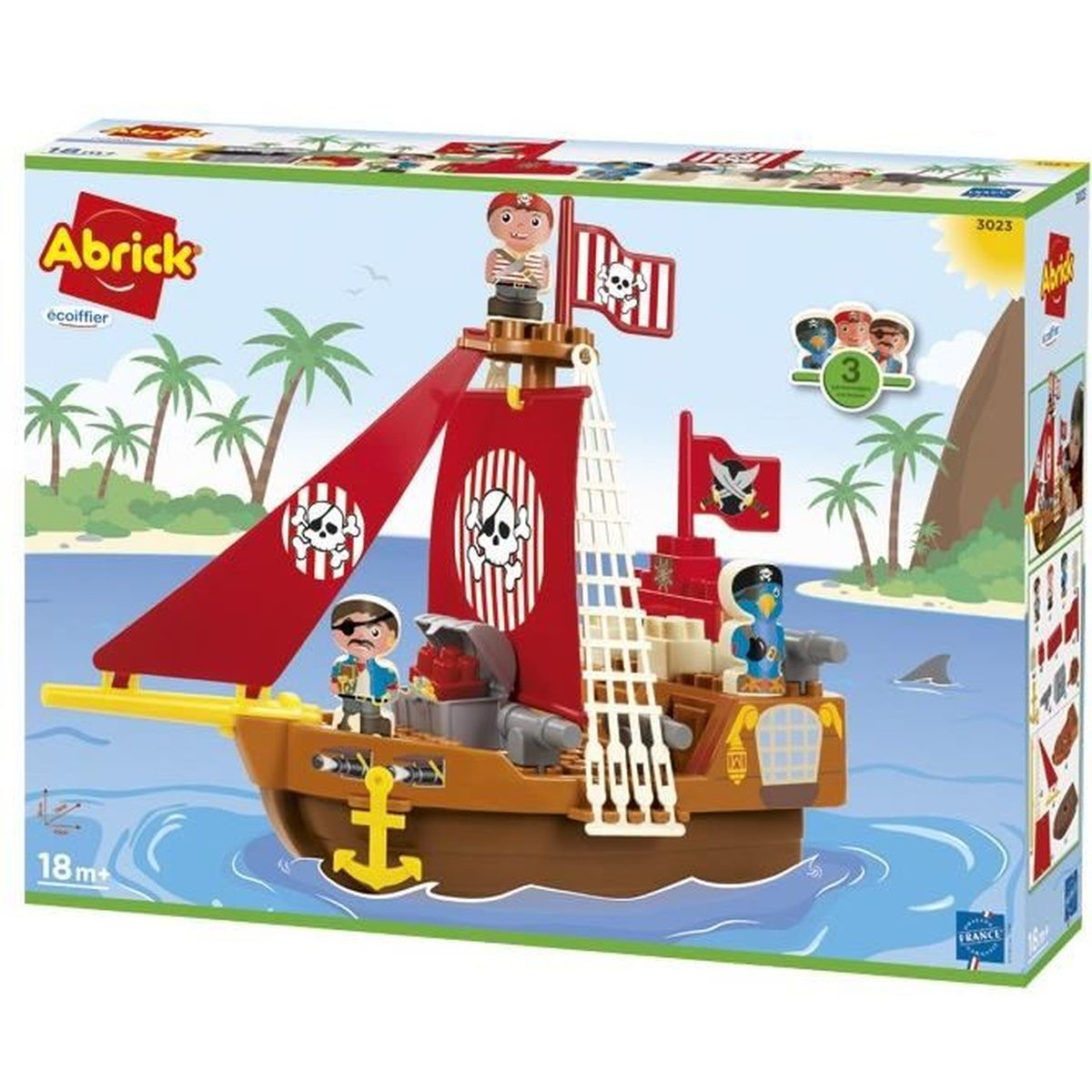 Ein Spielzeug-Piratenschiff in einer Box. Das Schiff hat rote Segel und Piratenfiguren. Die Box zeigt eine Szene.