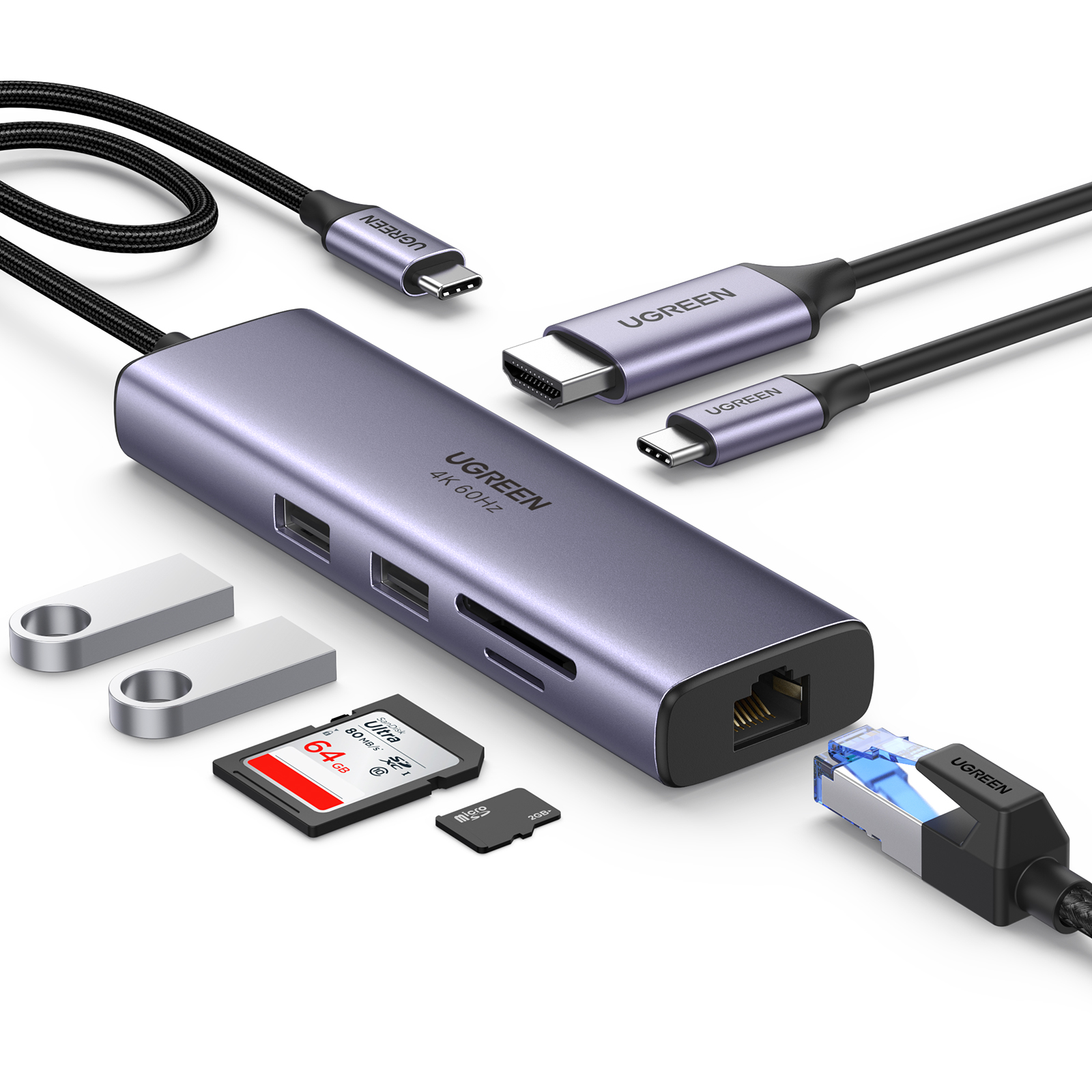 Concentrador Ugreen con múltiples puertos y cables adjuntos. Incluye ranuras USB, HDMI y tarjetas SD.