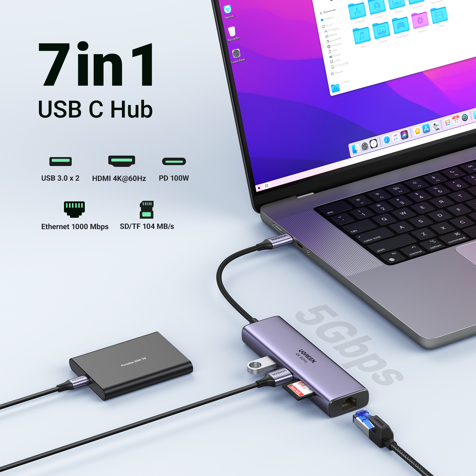 Hub USB C 7 en 1 conectado a un portátil, con varios puertos incluyendo USB 3.0 y HDMI.